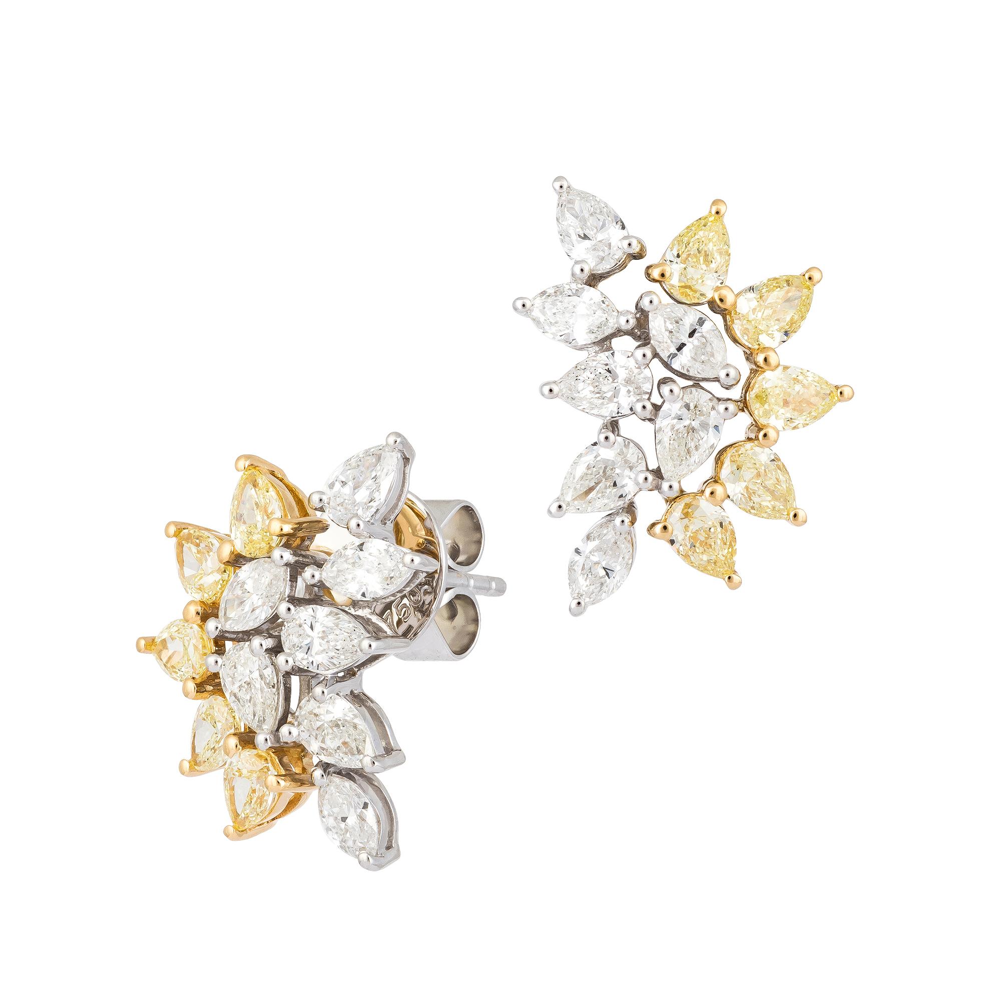 EARRINGS 18K White Gold
MQ 0.48 Cts/6 Pieces
PE 0.73 Cts/8 Pieces
Yellow Diamond 1.19 Cts/10 Pieces

With a heritage of ancient fine Swiss jewelry traditions, NATKINA is a Geneva based jewellery brand, which creates modern jewellery masterpieces