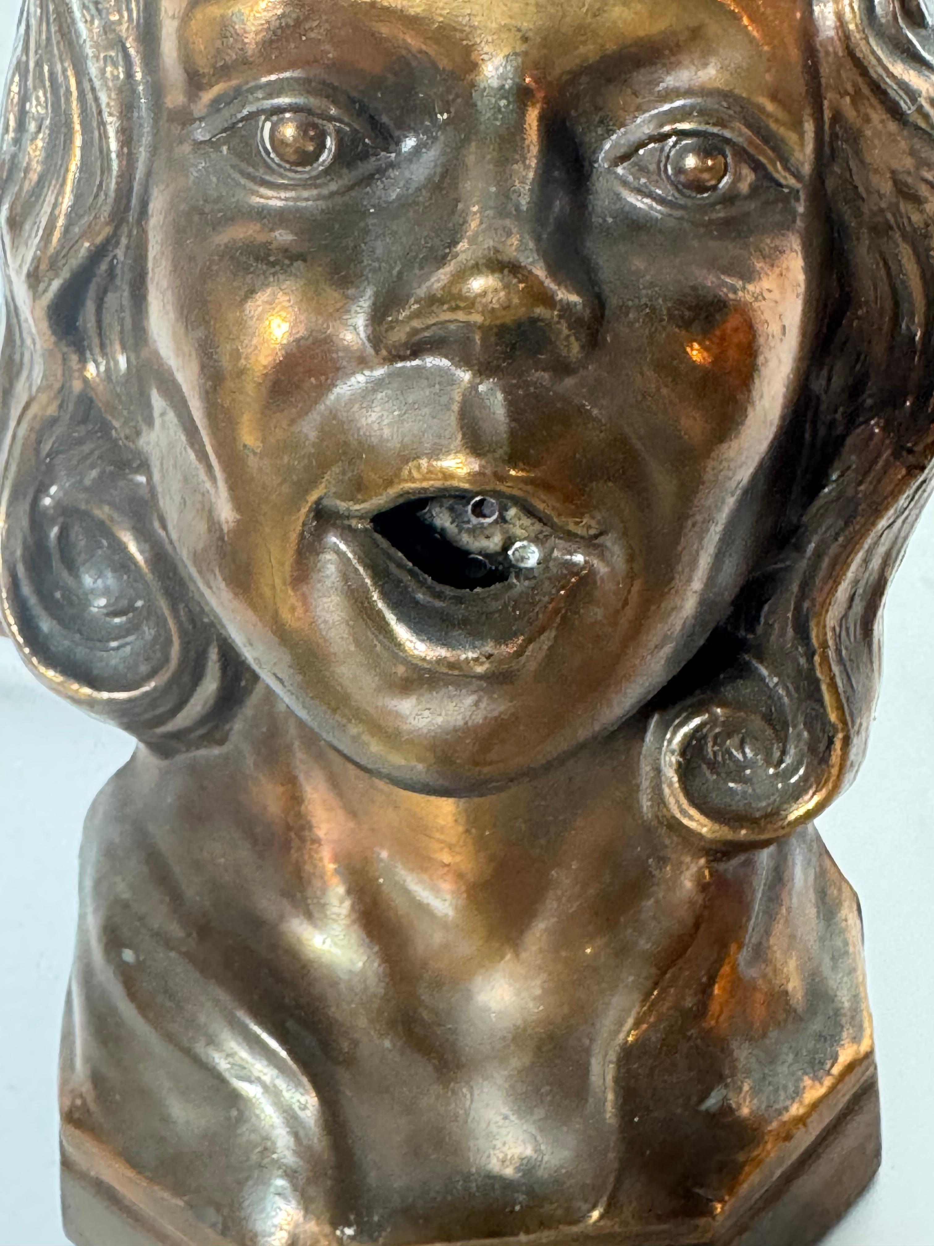 Stylized 1930s Art Deco Women's Head Electric Cigarette Lighter by Arturo Levi In Good Condition In Buffalo, NY