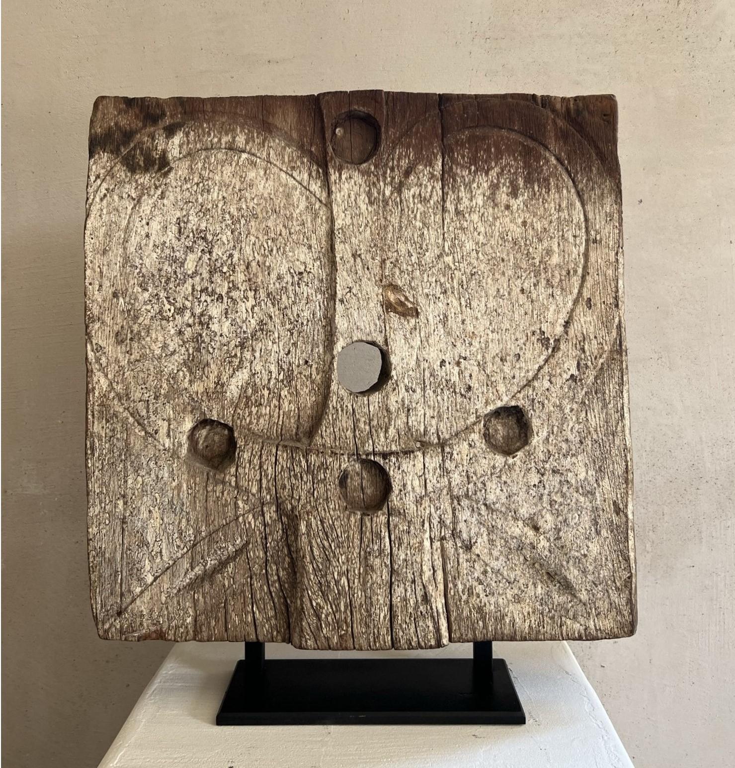 Sulawesi, Toraja, a wooden stylized sculpture of a ox head with original patina,
For the Indonesioan Toraja people the ox is a sacred animal. Depictions of the animal were believed to be a protection against bad energy. This particular sculpture