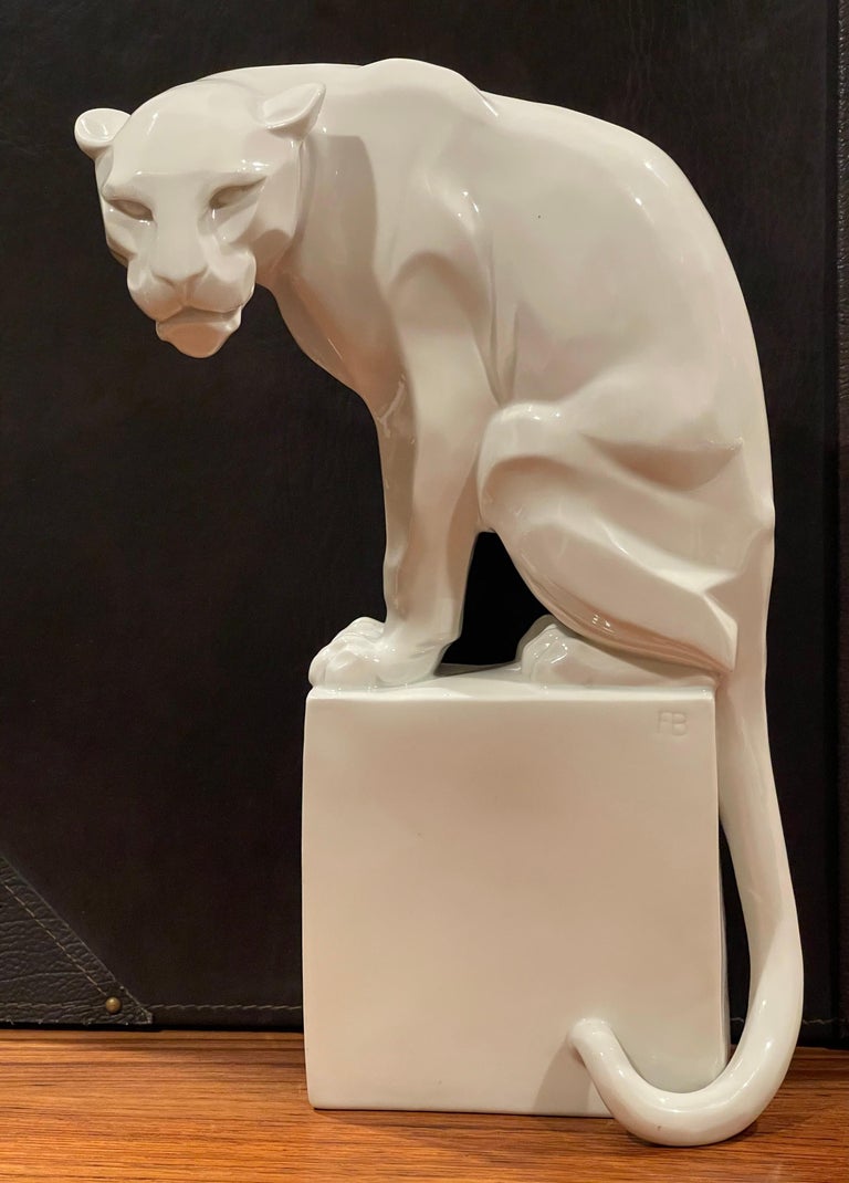 Stylized Art Deco porcelain panther model 1630 by Franz Barwig, circa 1934. The sculpture was made at the Augarten Porcelain Manufactory in Vienna, Austria and is in very good vintage condition with no chips, cracks or crazing. Incised signature to
