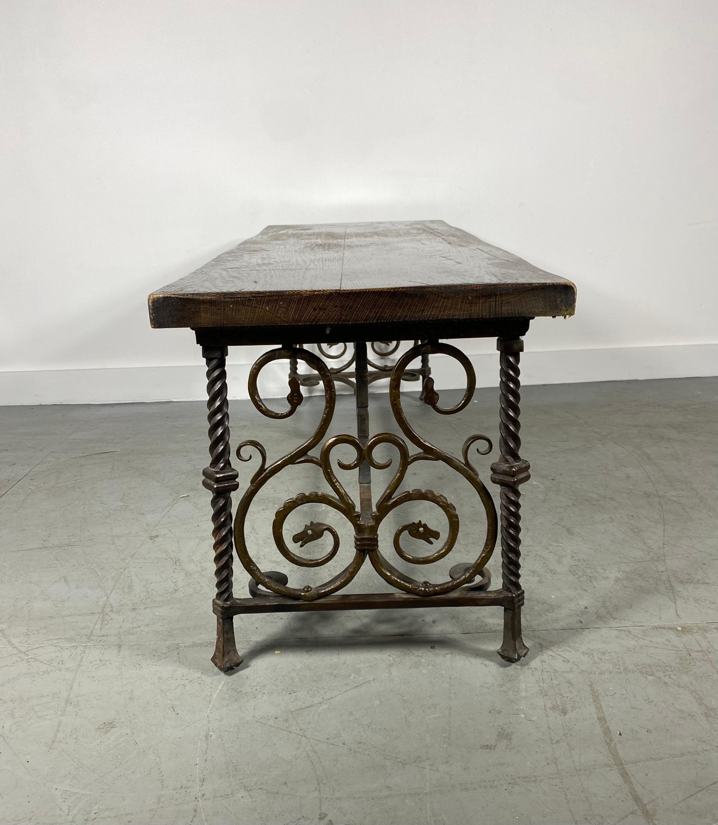 Stylized Bronze and Iron Bench/ Table attributed to Oscar Bruno Bach. Classic design, Quality casting, super stylized. Not certain if wood top is original.Wood be amazing marble or slate top. Hand delivery avail to New York City or anywhere en route