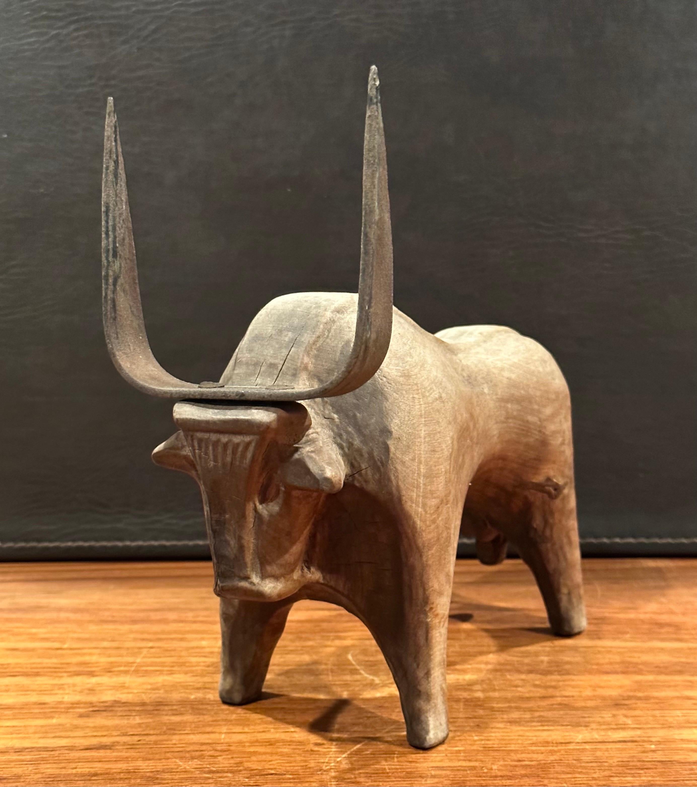 Hand-Carved Stylized Carved Wood and Iron Charging Bull Sculpture  For Sale