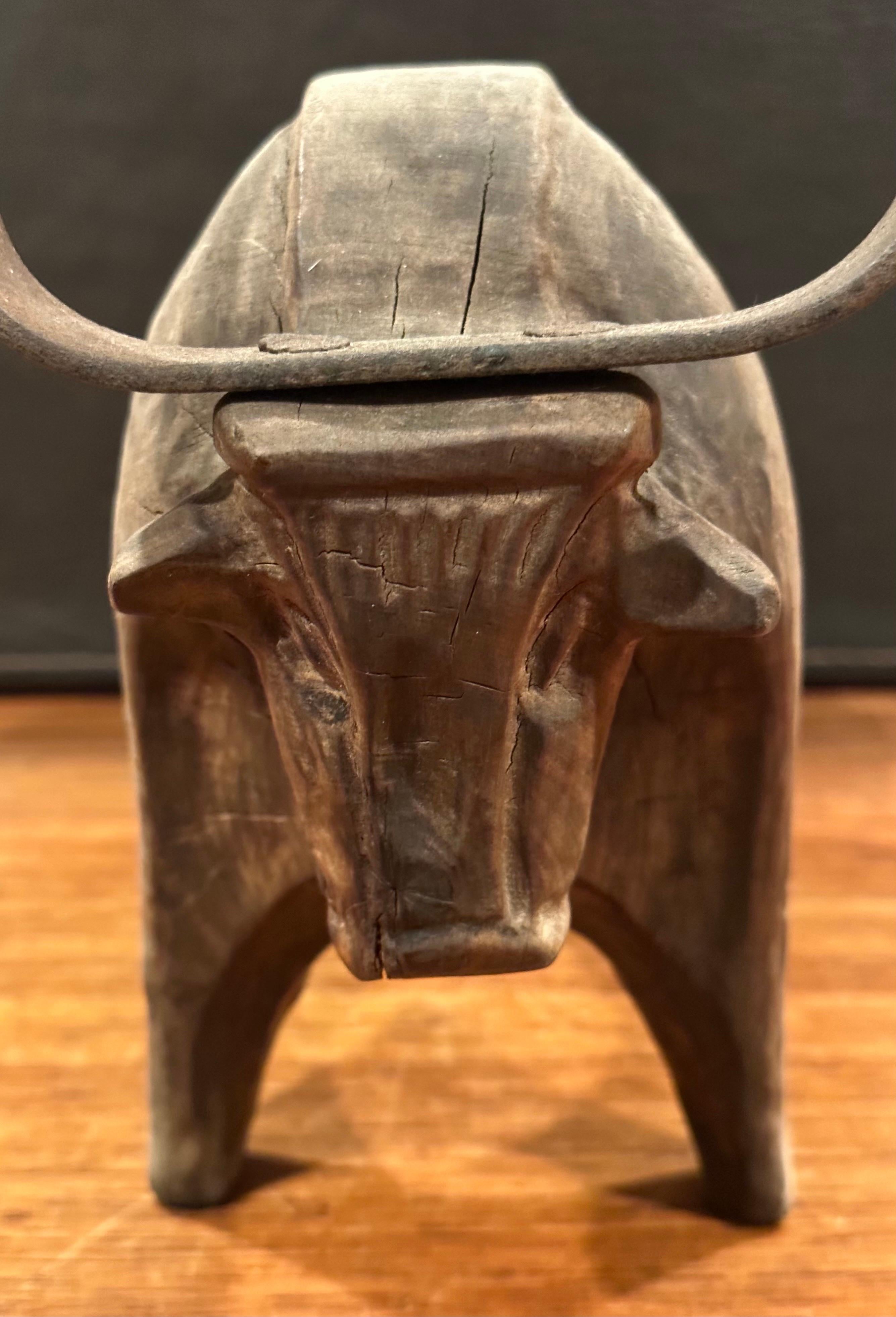 Stylized Carved Wood and Iron Charging Bull Sculpture  In Good Condition For Sale In San Diego, CA