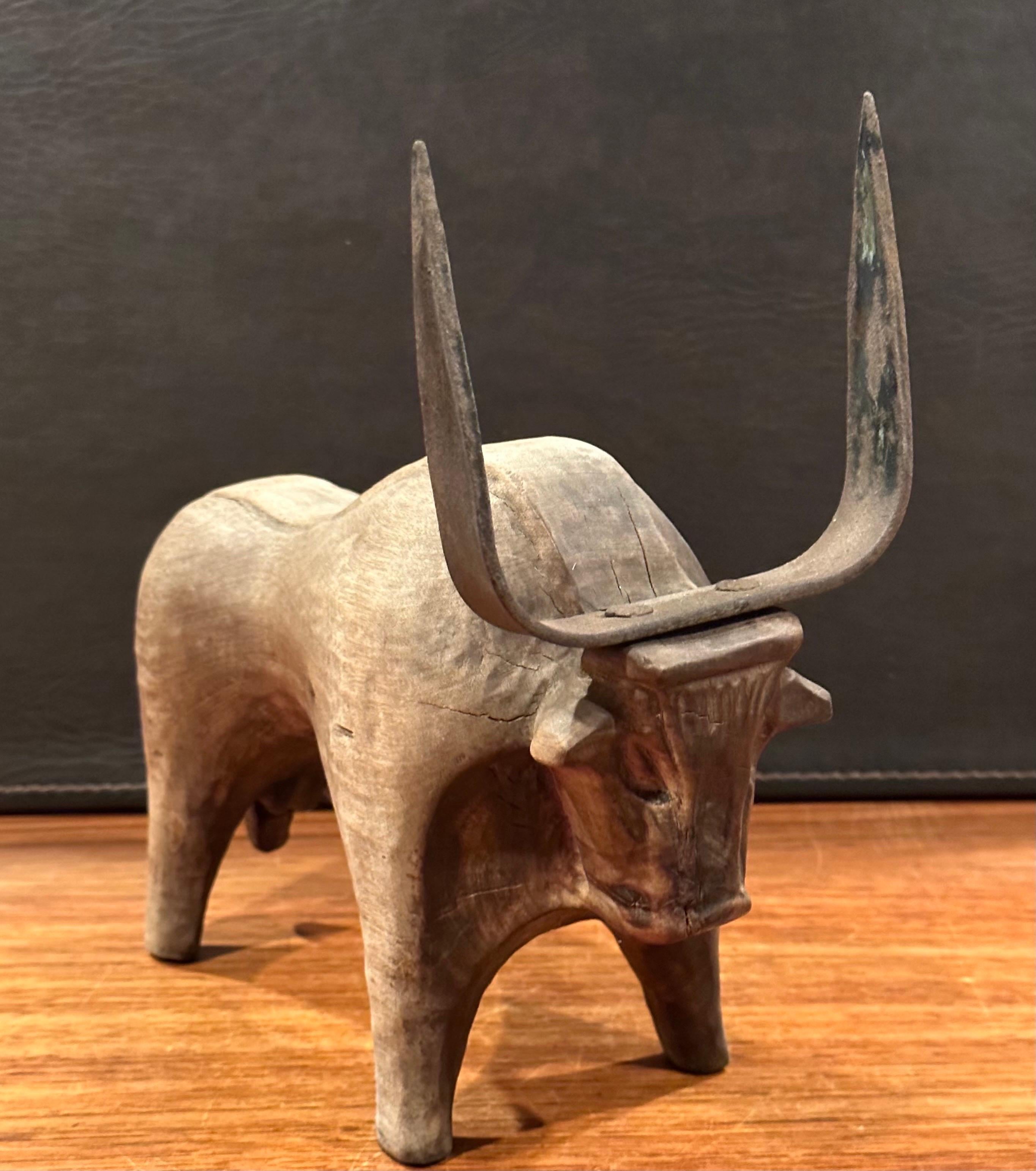 20th Century Stylized Carved Wood and Iron Charging Bull Sculpture  For Sale