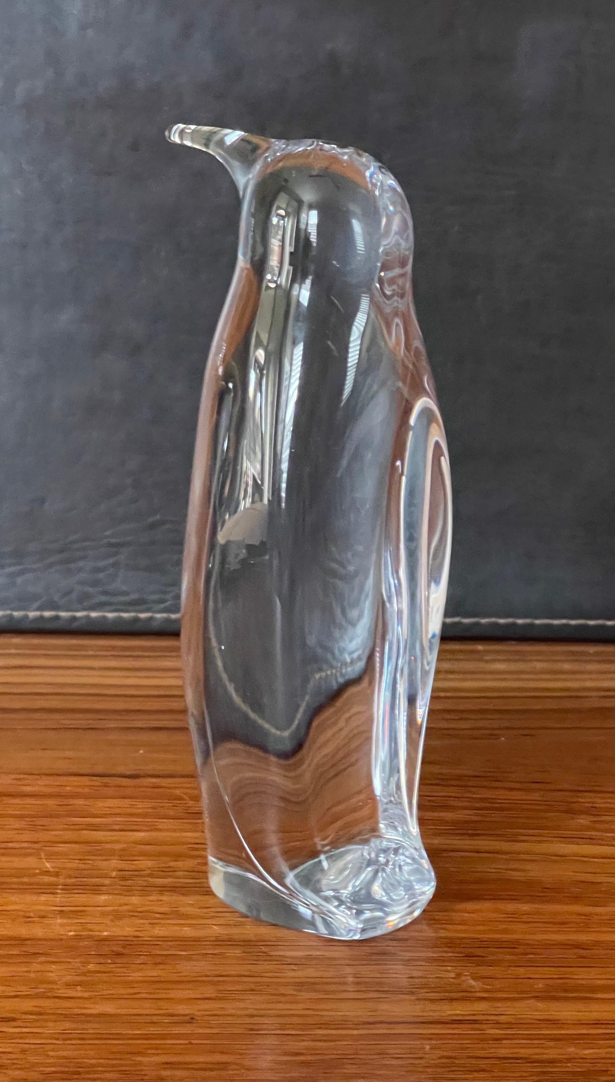Stylized crystal penguin sculpture by Daum France, circa 1980s. The etched signature reads 