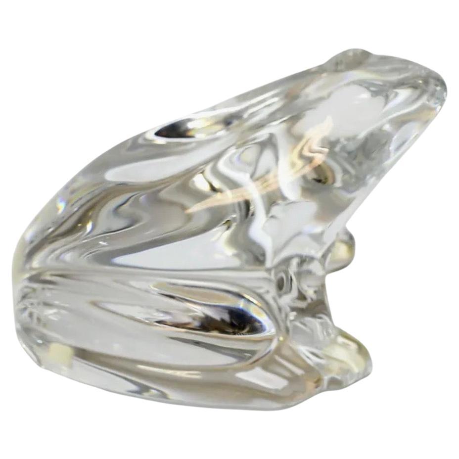 Gorgeous stylized frog sculpture / paperweight by Baccarat, circa 1990s. The piece is in excellent condition with no visible imperfections and has great clarity. Signed on the underside, the piece measures 3.25