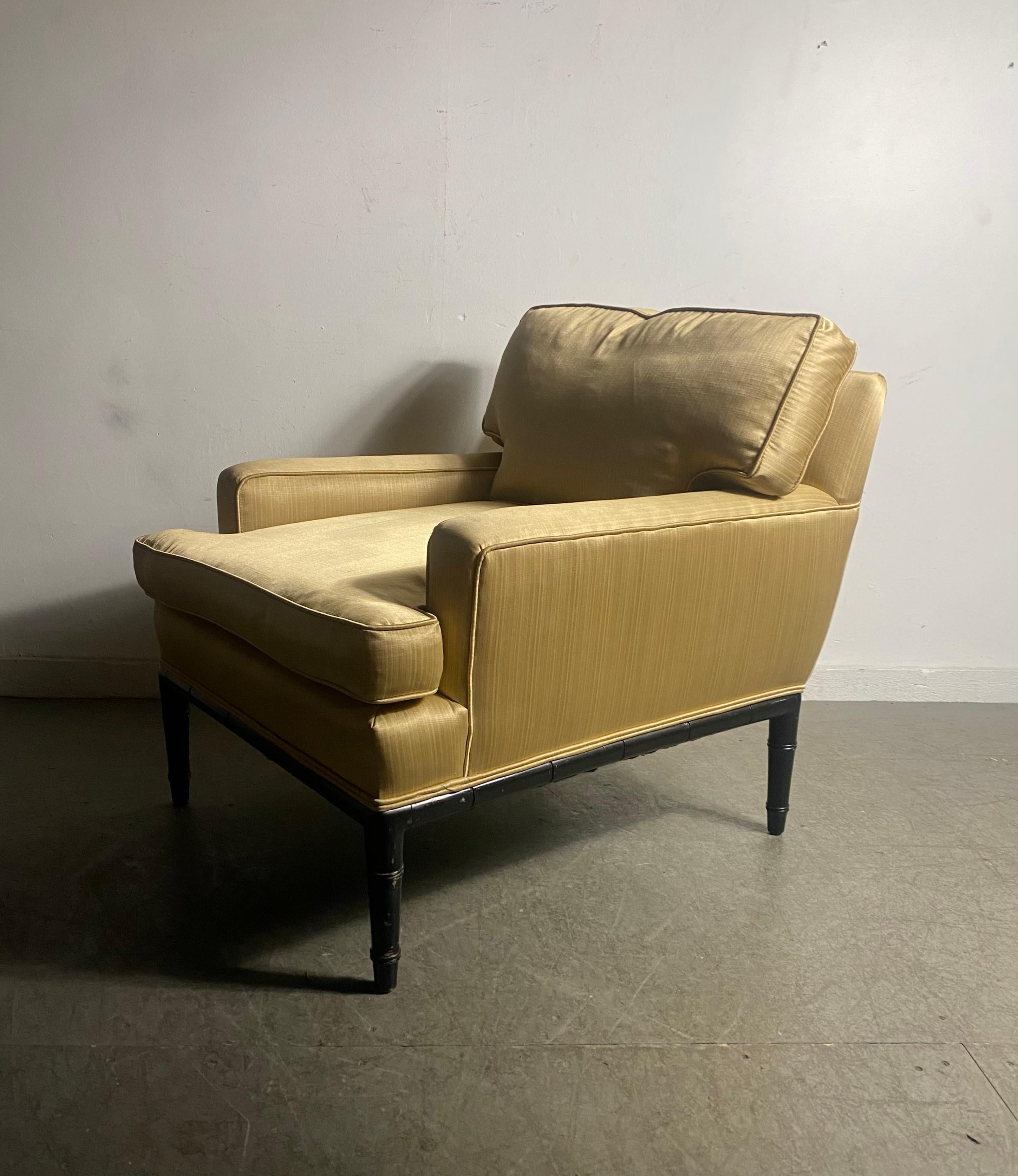 Stylized Low profile Lounge Chair by Baker,,Lacquer Faux Bamboo,,silk, down filled..Extremely comfortable.. Superior quality and construction..Nice original condition,,minor snags.thread pulls to back (see photo) Hand delivery avail to New York City