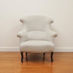 Sedia ad ala imbottita stilizzata in stile Mid-Century Modern