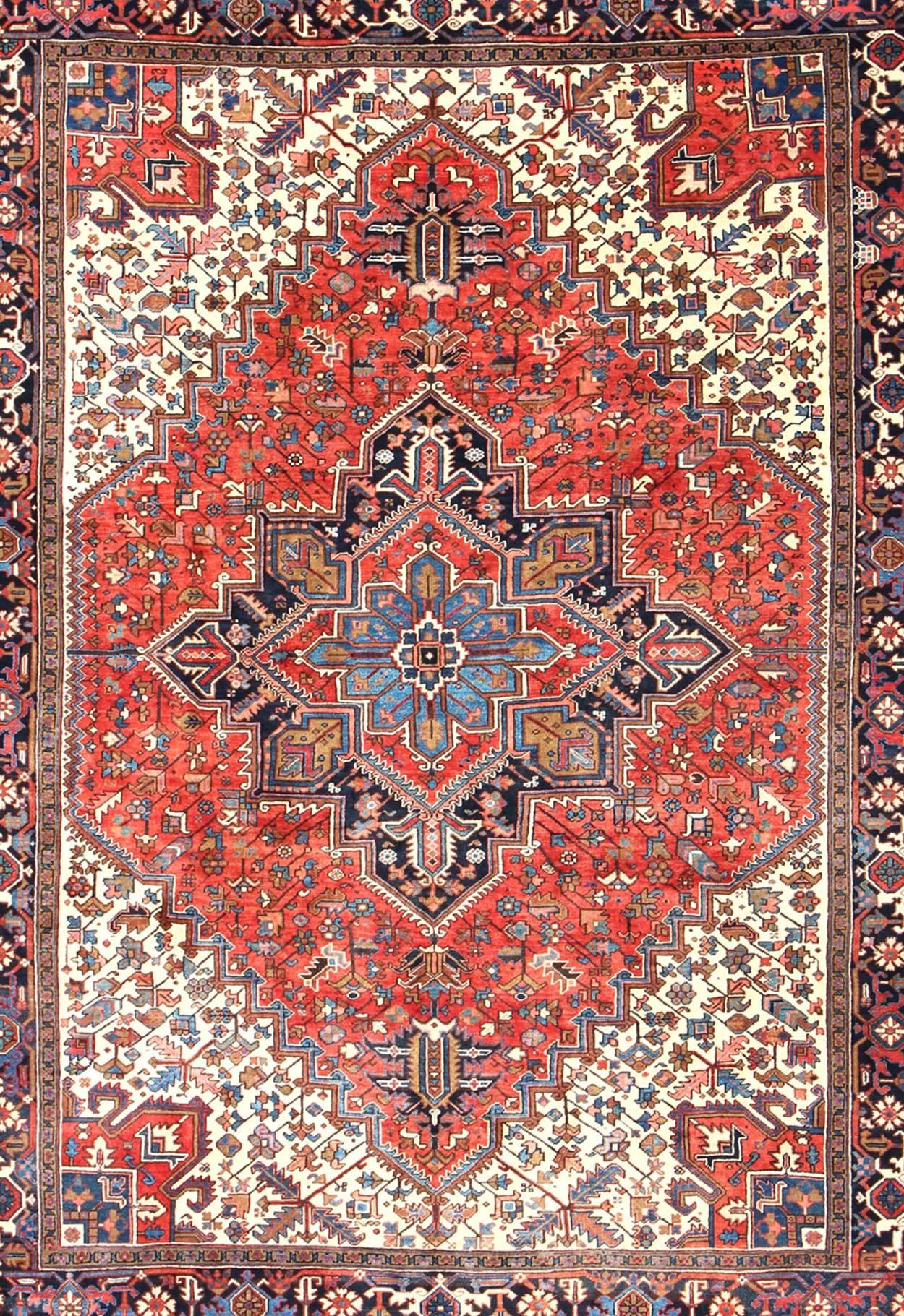 Heriz Serapi Semi Antique Persian Heriz Rug with Center Medallion Design in Rust Red and Blue