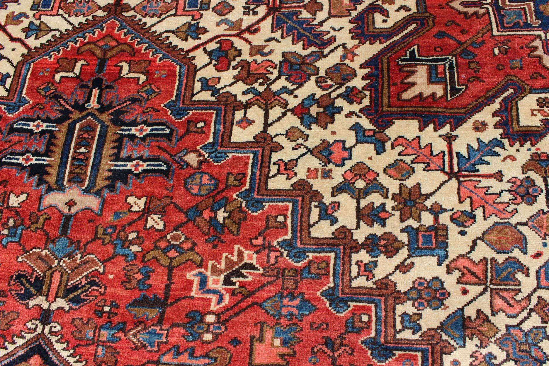 Wool Semi Antique Persian Heriz Rug with Center Medallion Design in Rust Red and Blue