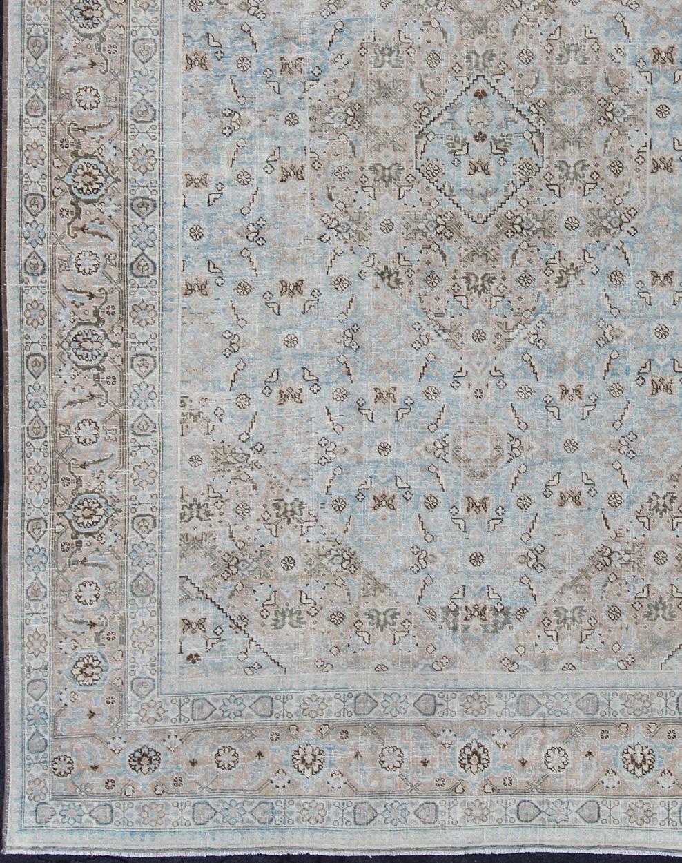 Hand-Knotted Stylized Persian Antique Tabriz Rug with Medallion Design and Muted Colors For Sale