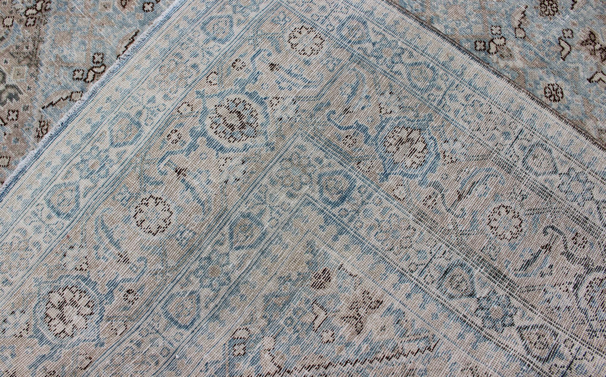 20th Century Stylized Persian Antique Tabriz Rug with Medallion Design and Muted Colors For Sale