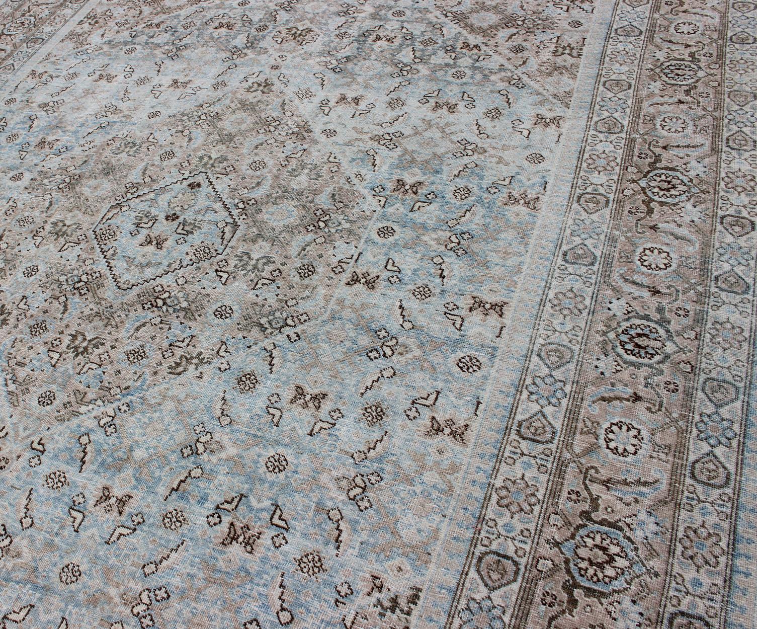 Wool Stylized Persian Antique Tabriz Rug with Medallion Design and Muted Colors For Sale