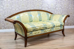 Stylized Walnut Sofa from the Early 20th Century with New Upholstery