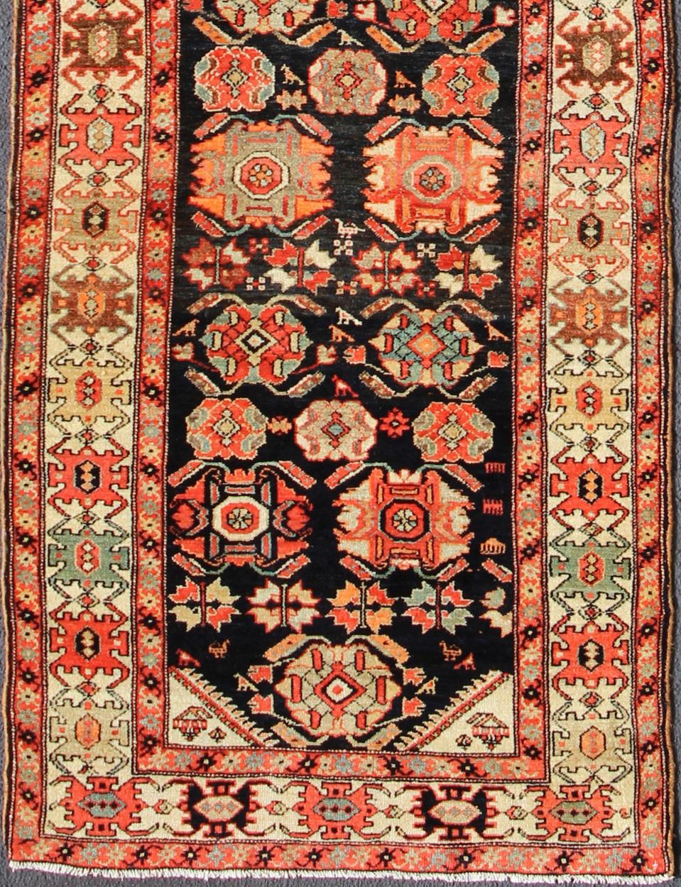 Orange and black antique Persian Malayer runner with Sub-geometric design, rug ema-7571, country of origin / type: Iran / Malayer, circa 1910.

This magnificent antique Persian Malayer runner (circa 1910) bears a beautiful, expansive, all-over Sub