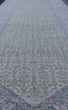 Sub-Geometric Paisley Designed Rug with Muted Tones of Yellow-Green and Brown