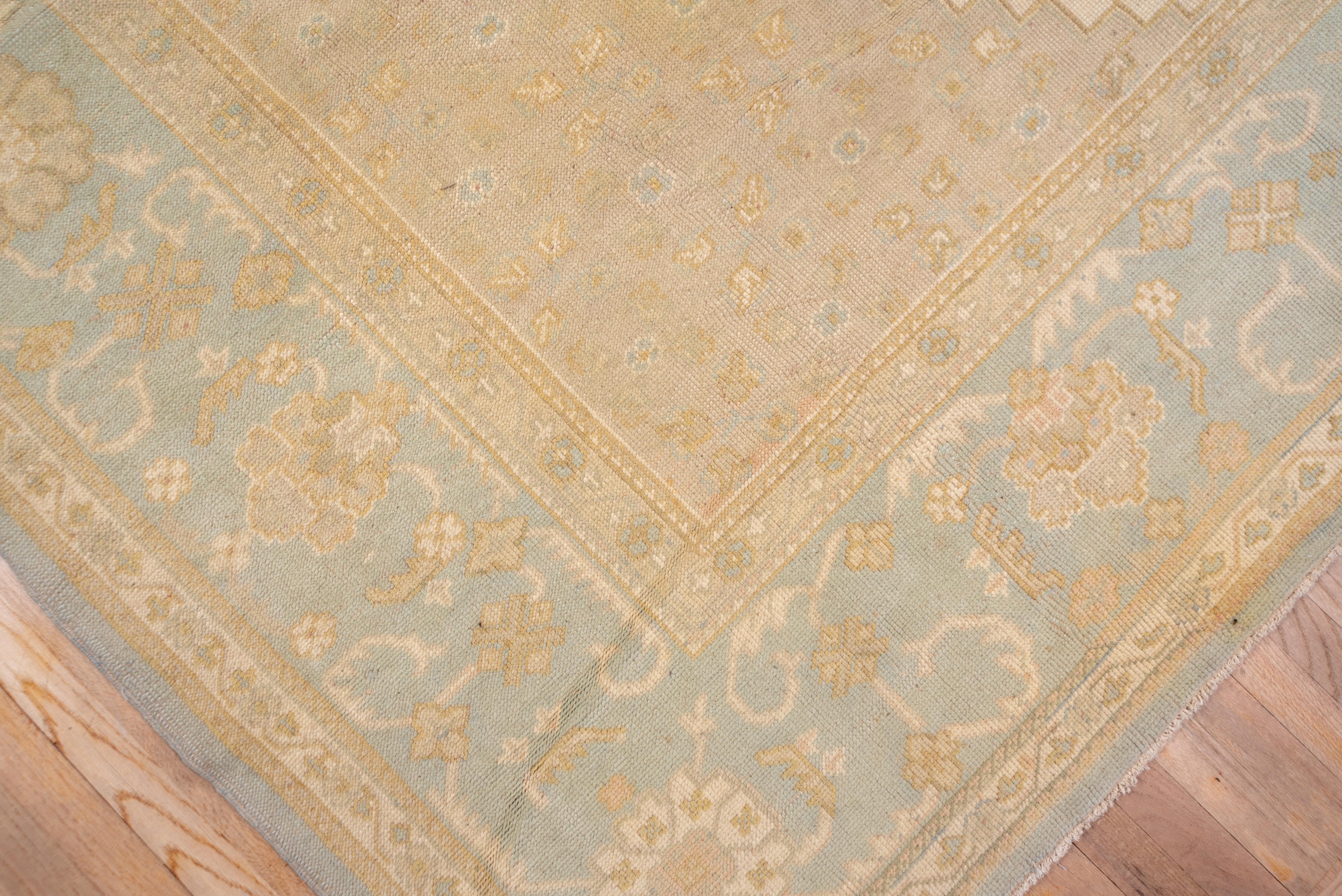 Early 20th Century Subdued Antique Oushak Carpet, circa 1910s For Sale
