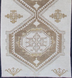 Subdued Vintage Turkish Oushak Runner with Medallions in Cream and Brown