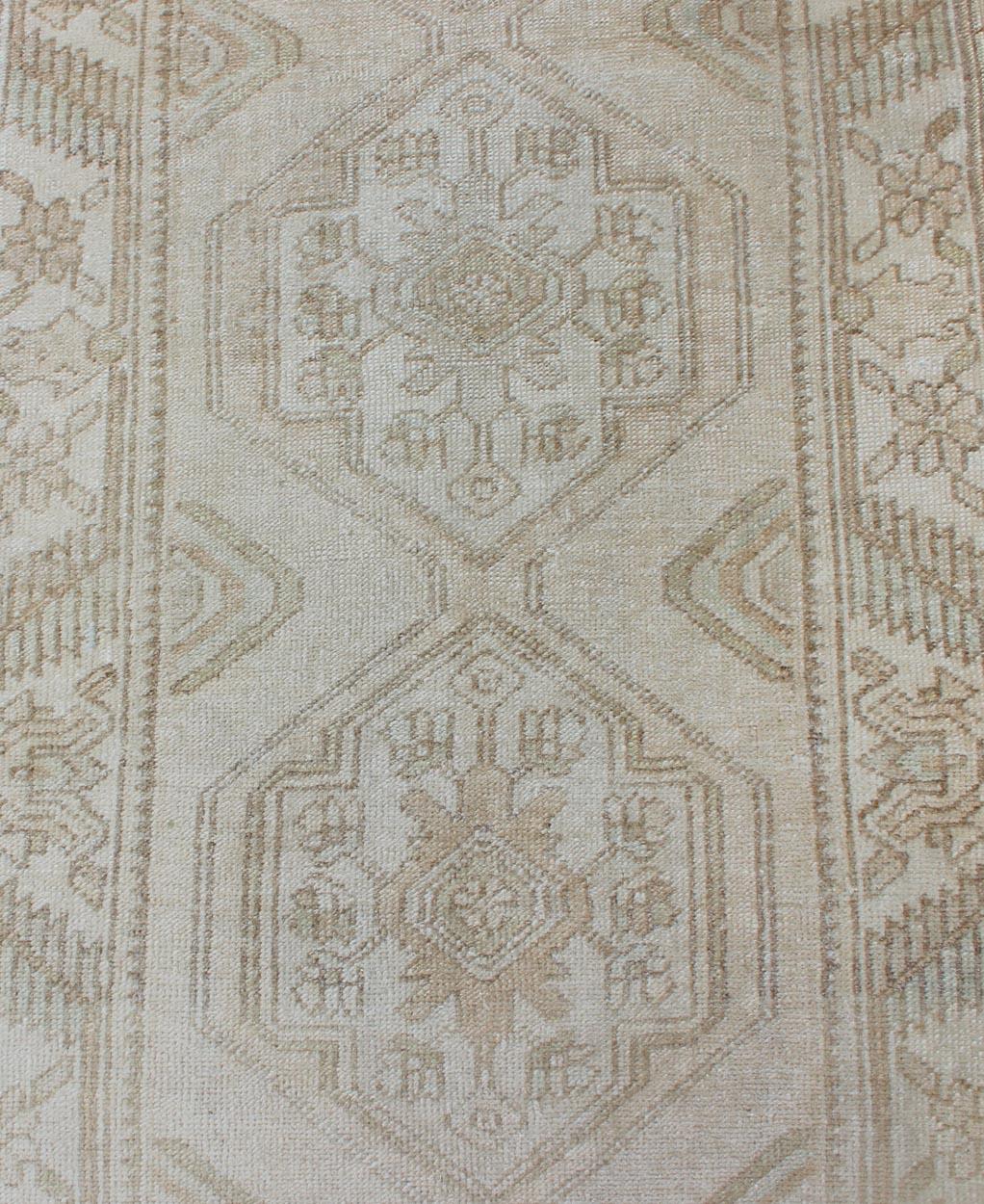 Subdued Vintage Turkish Oushak Runner with Medallions in Soft Cream For Sale 1