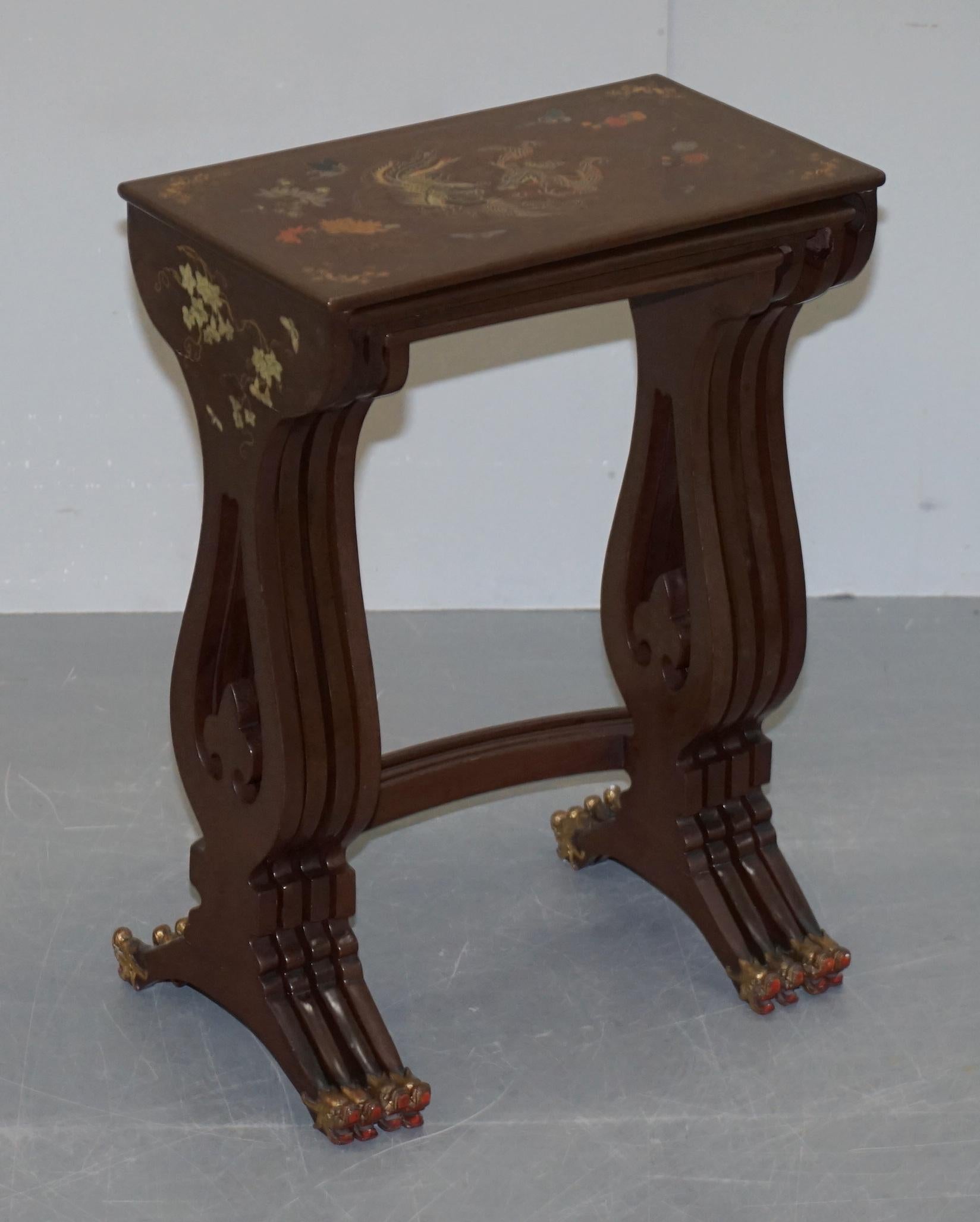 We are delighted to offer for sale this sublime nest of four original Chinese brown lacquered tables with dragon carved feet and gold leaf detailing

A good looking, decorative and well made set, they are totally original and unrestored, the brown