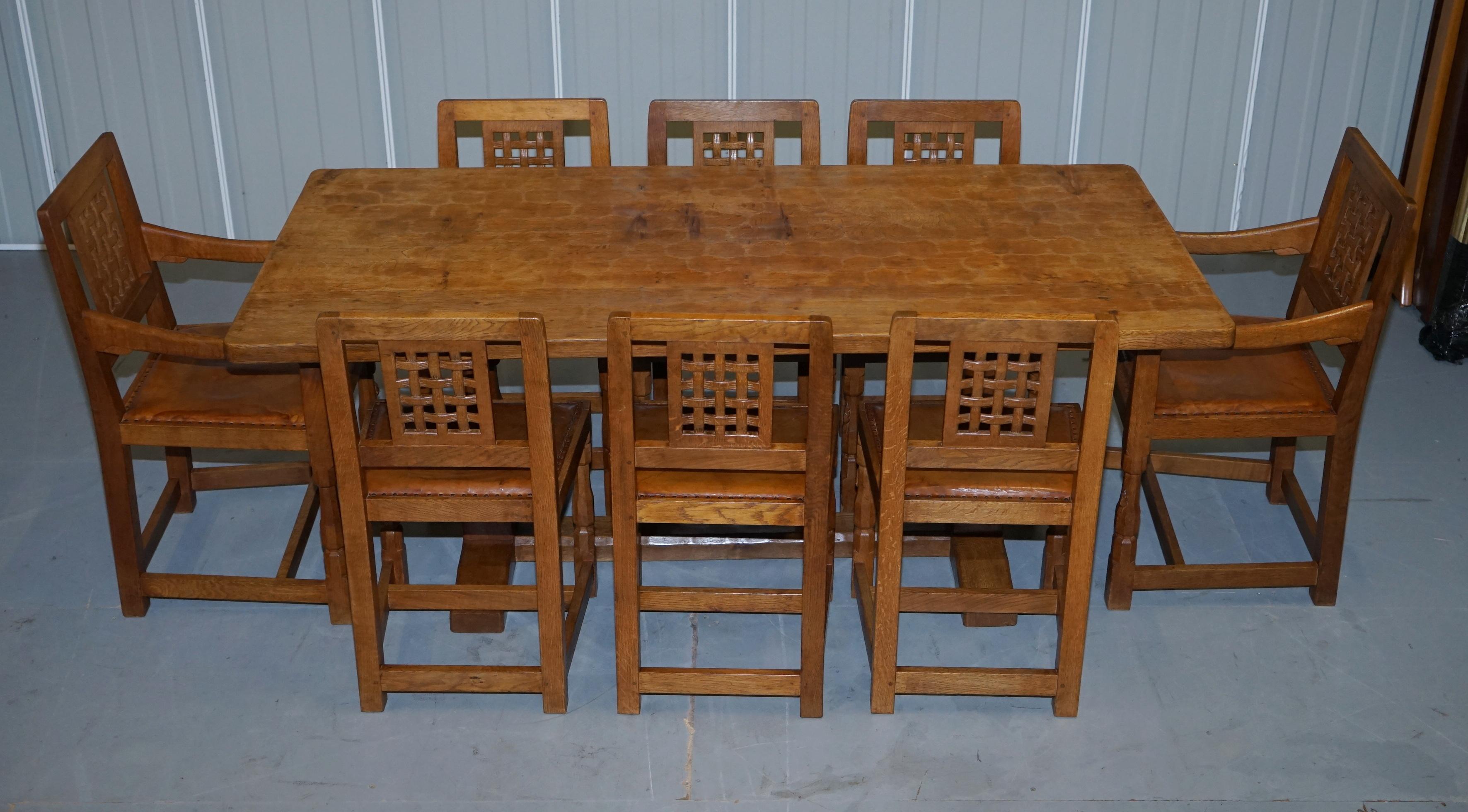 We are delighted to offer for sale this very collectable 1968 Robert Mouseman Thompson English oak refectory dining table and eight dining chairs which have a sublime patination

I have two suites of Mouseman chairs listed under my other items,