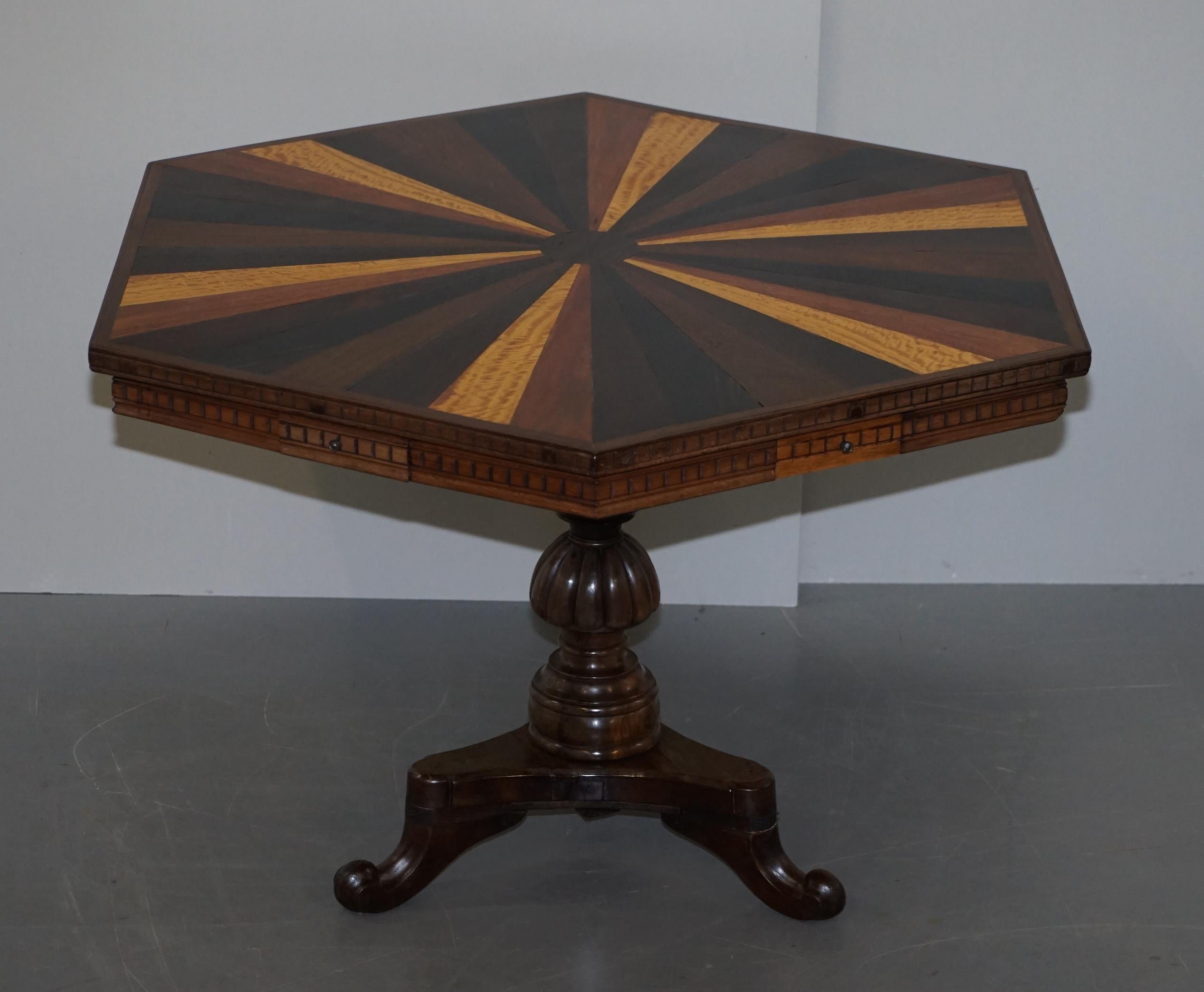 We are delighted to offer for sale this absolutely glorious Anglo-Indian Specimen wood occasional centre table

A very fine and rare table, most likely Sri Lankan Galle district in the mid 19th century. The piece various cuts of timber, ebony and