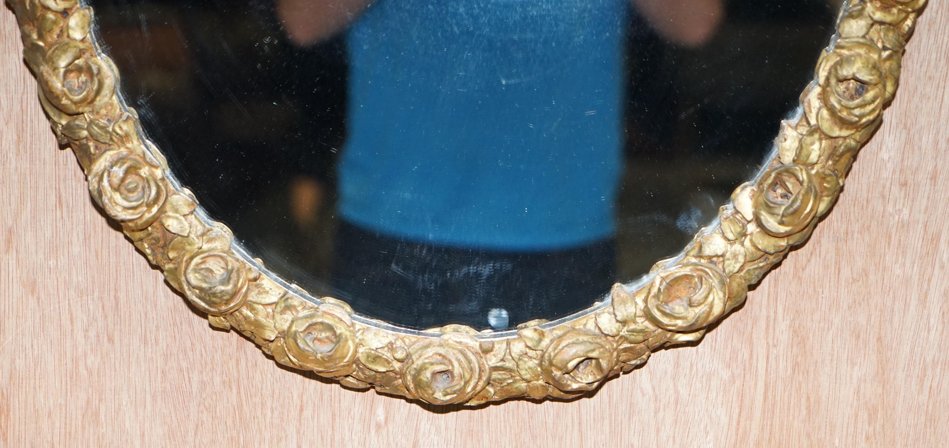 We are delighted to offer for sale this lovely original French giltwood 19th century original plate glass mirror with rose flower bud frame

A truly stunning mirror, the frame is comprised of rose buds, its hand carved wood which is then plaster