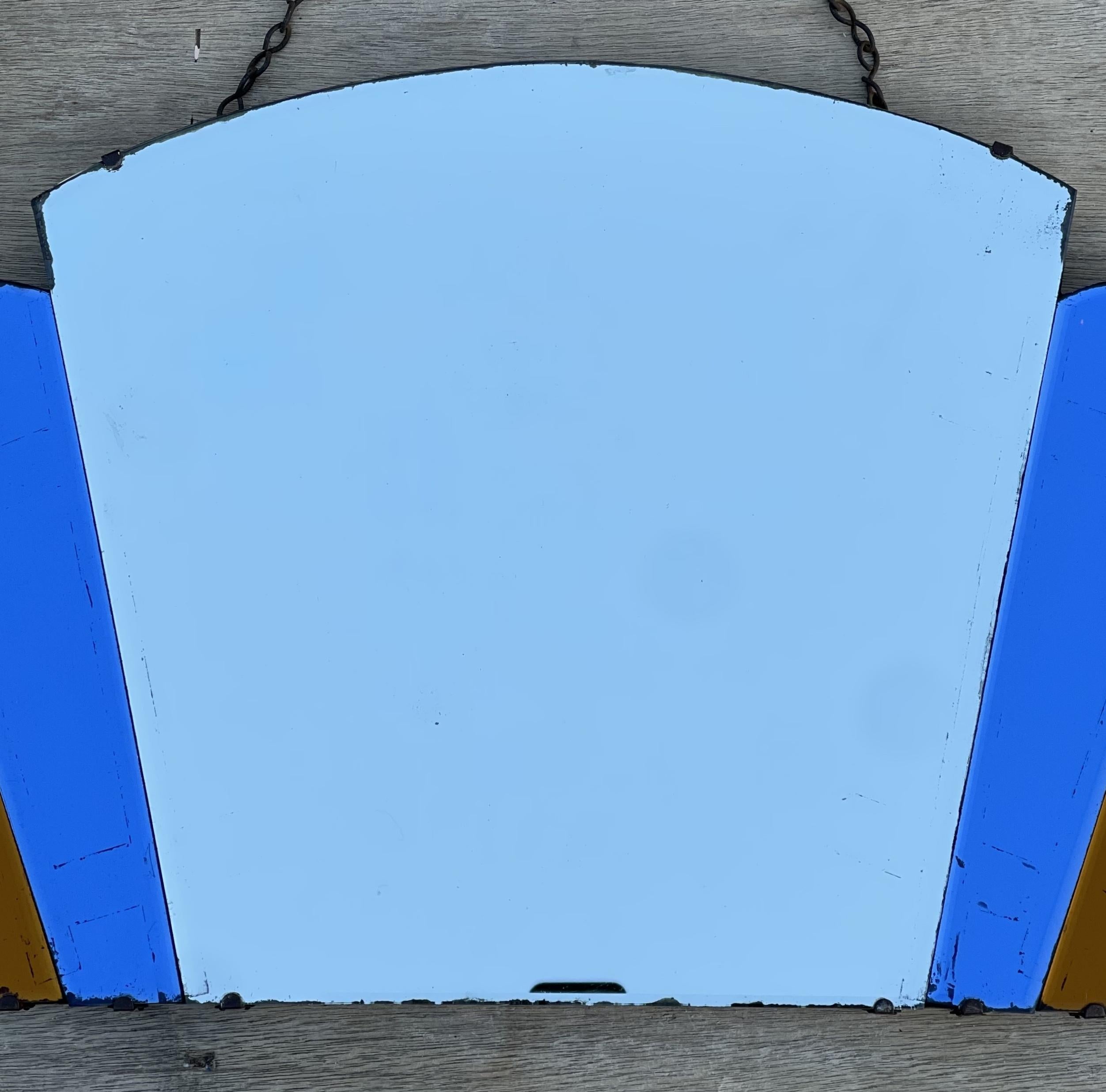 We are delighted to offer for sale absolutely sublime burnt orange & cobalt blue glass Art Deco New York fan mirror 

This mirror is very decorative and well made, the cobalt blue and burnt orange panels laid out in a fan just scream Art Deco