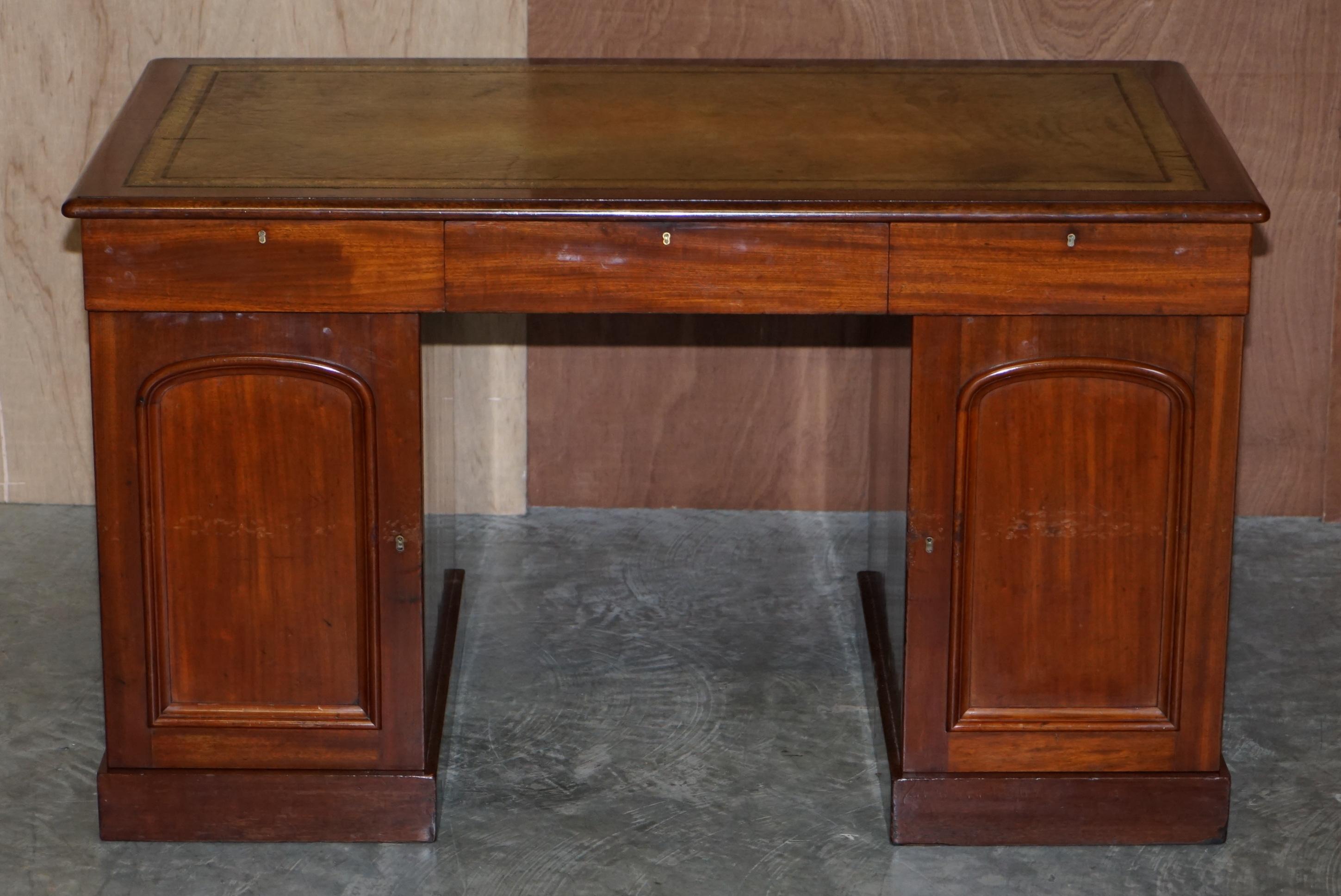 desk with green leather top