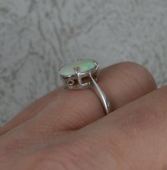Sublime Antique Platinum and Natural Opal Solitaire Ring
