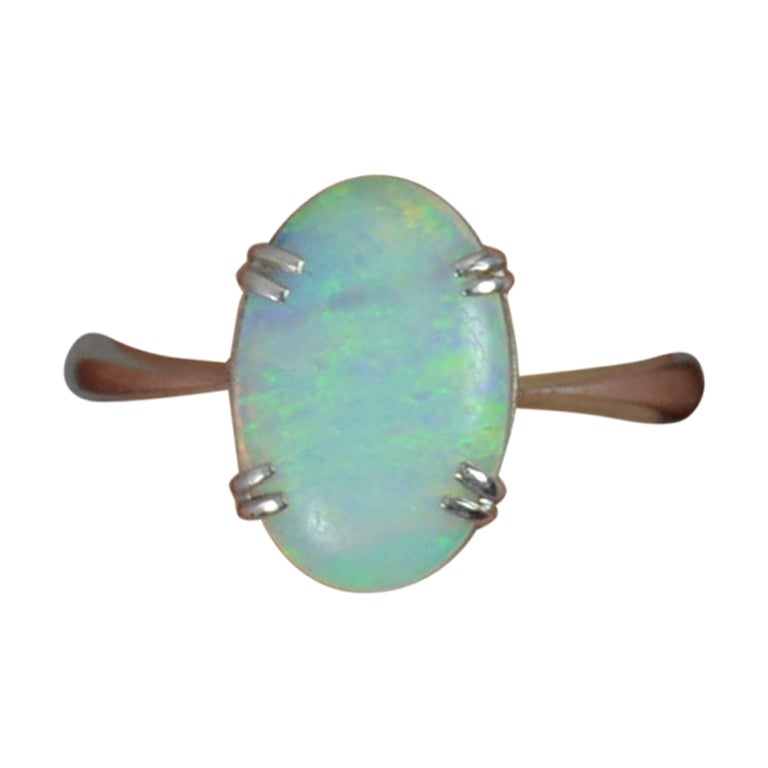 Sublime Antique Platinum and Natural Opal Solitaire Ring