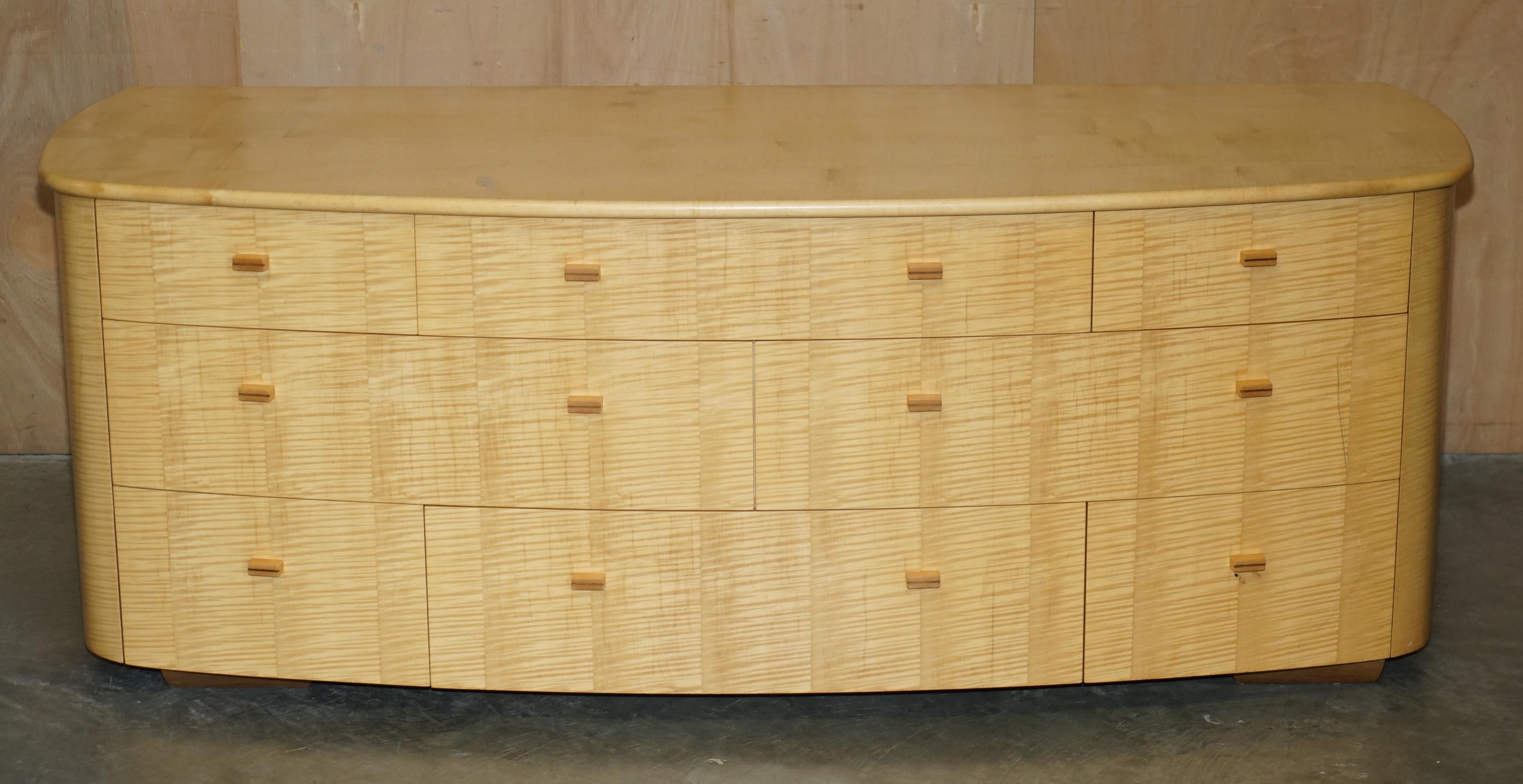 Royal House Antiques

Royal House Antiques is delighted to offer for sale this truly sublime hand made in England Baxter & Lee Satin Birch Bow Fronted chest of drawers sideboard which is part of a suite

Please note the delivery fee listed is just a