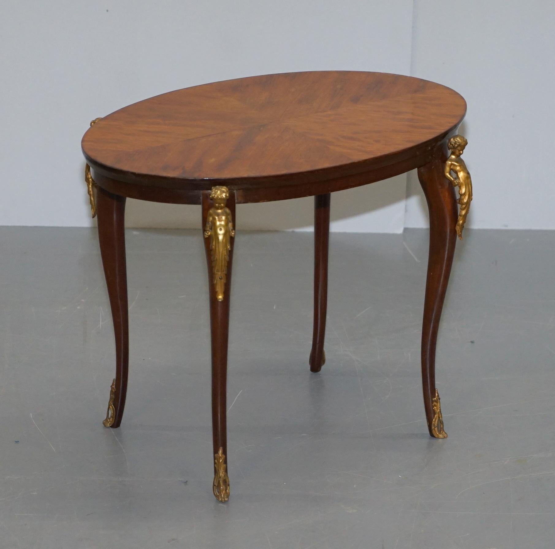 We are delighted to offer for sale this lovely circa 1880 Gilt bronze mounted tulip wood Cherub side occasional coffee table

A very good looking and well made piece, the gilt bronze mounts are very Regency however I believe this to be a high