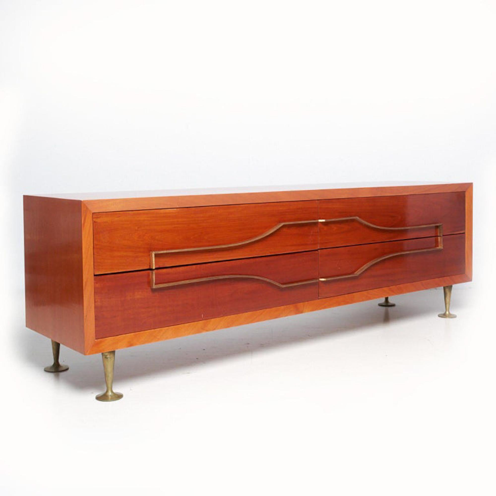 Dresser
Sublime sculptural double dresser in rich mahogany wood + brass attributed to Eugenio Escudero Mexico Modernism 1950s.
Unmarked. 
Dresser drawers are constructed with double dovetail joinery in solid mahogany.
Clever design solid brass