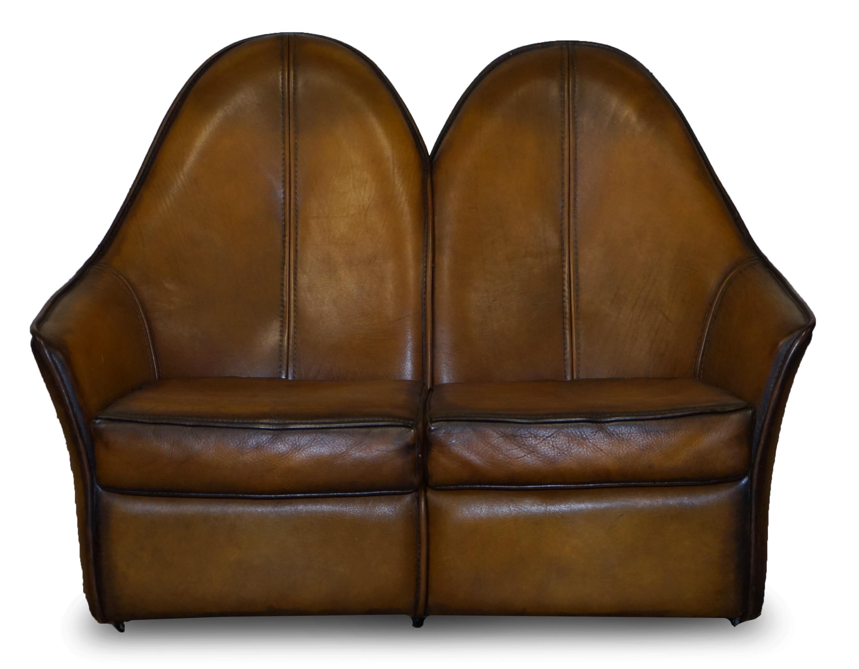 We are delighted to offer for sale this stunning fully restored vintage hand dyed Cigar brown leather Art modern two-seat sofa which is part of a large suite

As mentioned this is part of a suite, in total I have a pair of armchairs, a two seat