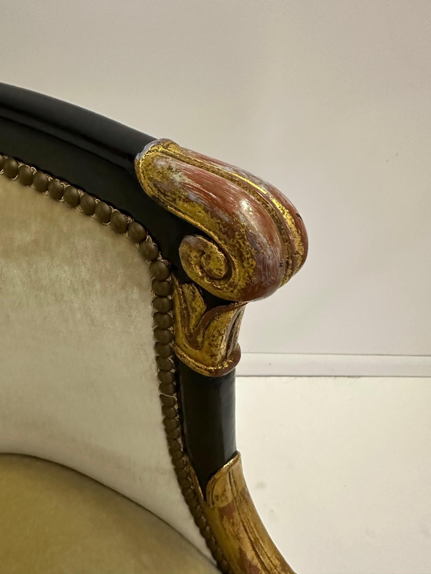 Sublime Hollywood Regency Gilt and Ebonized Club Chair with Dolphin Motif In Good Condition In Hopewell, NJ
