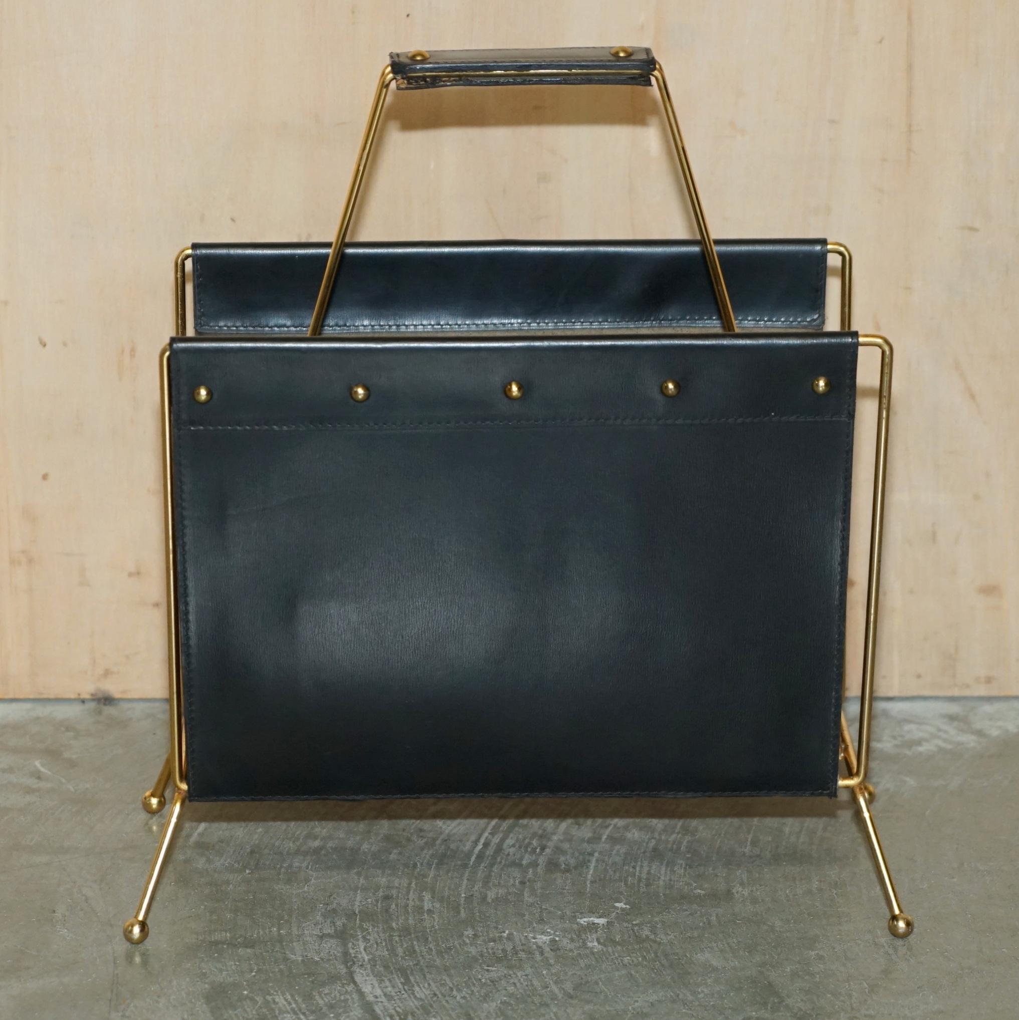 Royal House Antiques

Royal House Antiques is delighted to offer for sale this absolutely exquisite super collectable Jacques Adnet Black Leather and Gold Gilt Brass magazine / newspaper rack 

Please note the delivery fee listed is just a guide, it