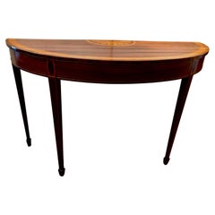 Sublime console Demilune di George Large in mogano intarsiato e legno satinato