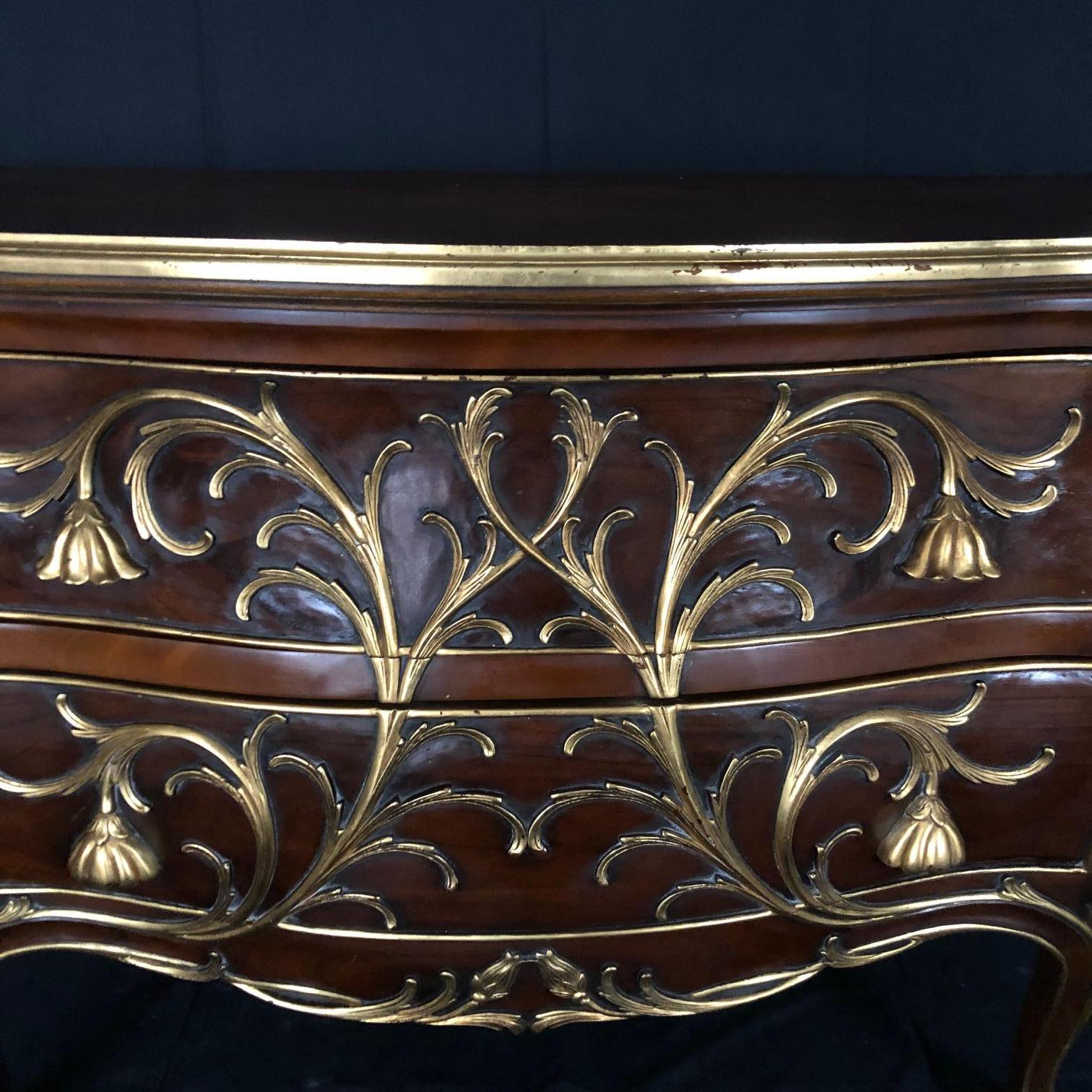 French Sublime Louis XV Serpentine Chest or Commode with Rare Gold Floral Details