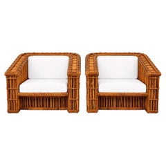 Splendida coppia di grandi sedie a sdraio vintage in rattan e canna di McGuire