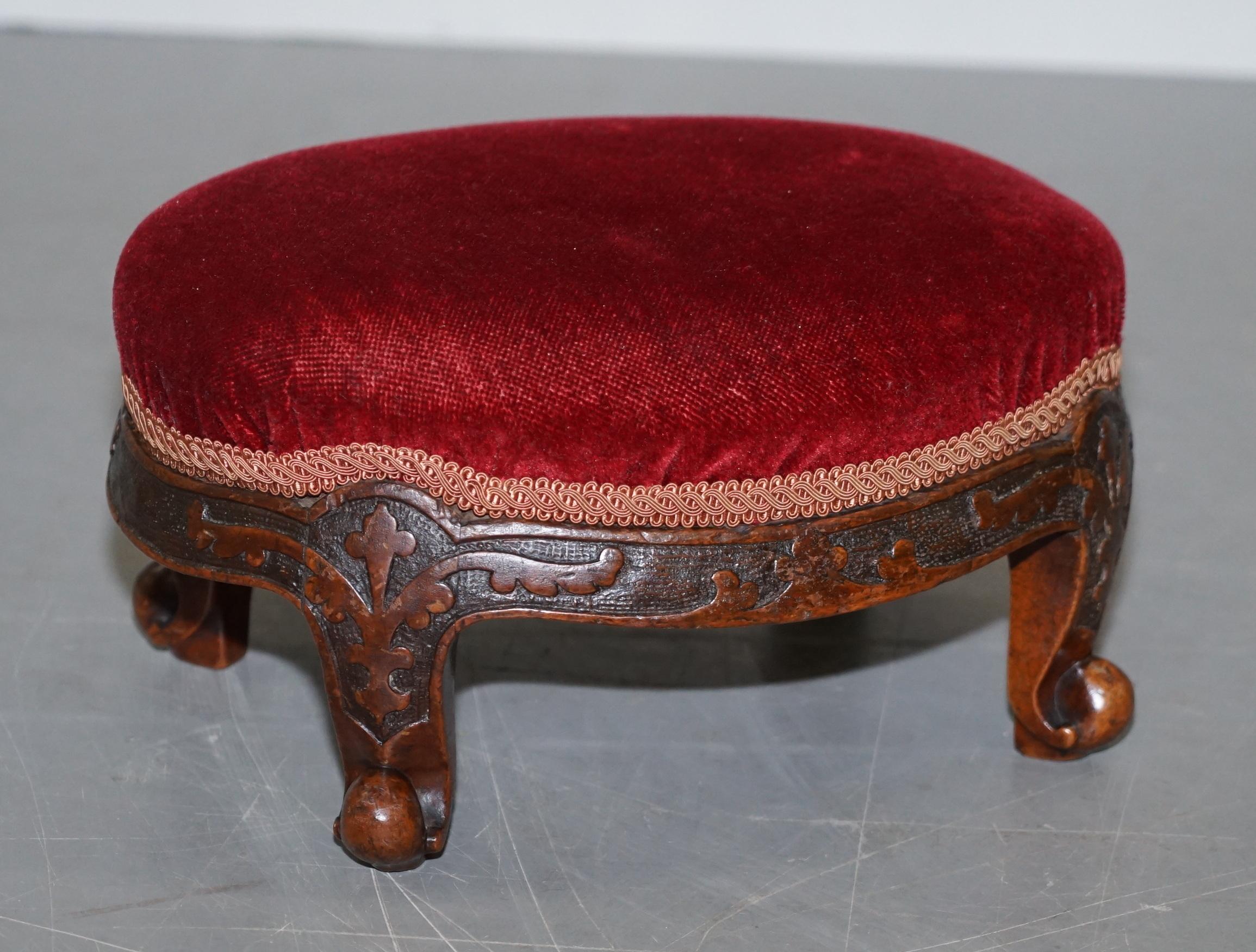 We are delighted to offer for sale this very fine pair of original George II circa 1760 English mahogany footstools

These are absolutely exquisite, made in the Chippendale era and clearly after his style of carving. The detail is never