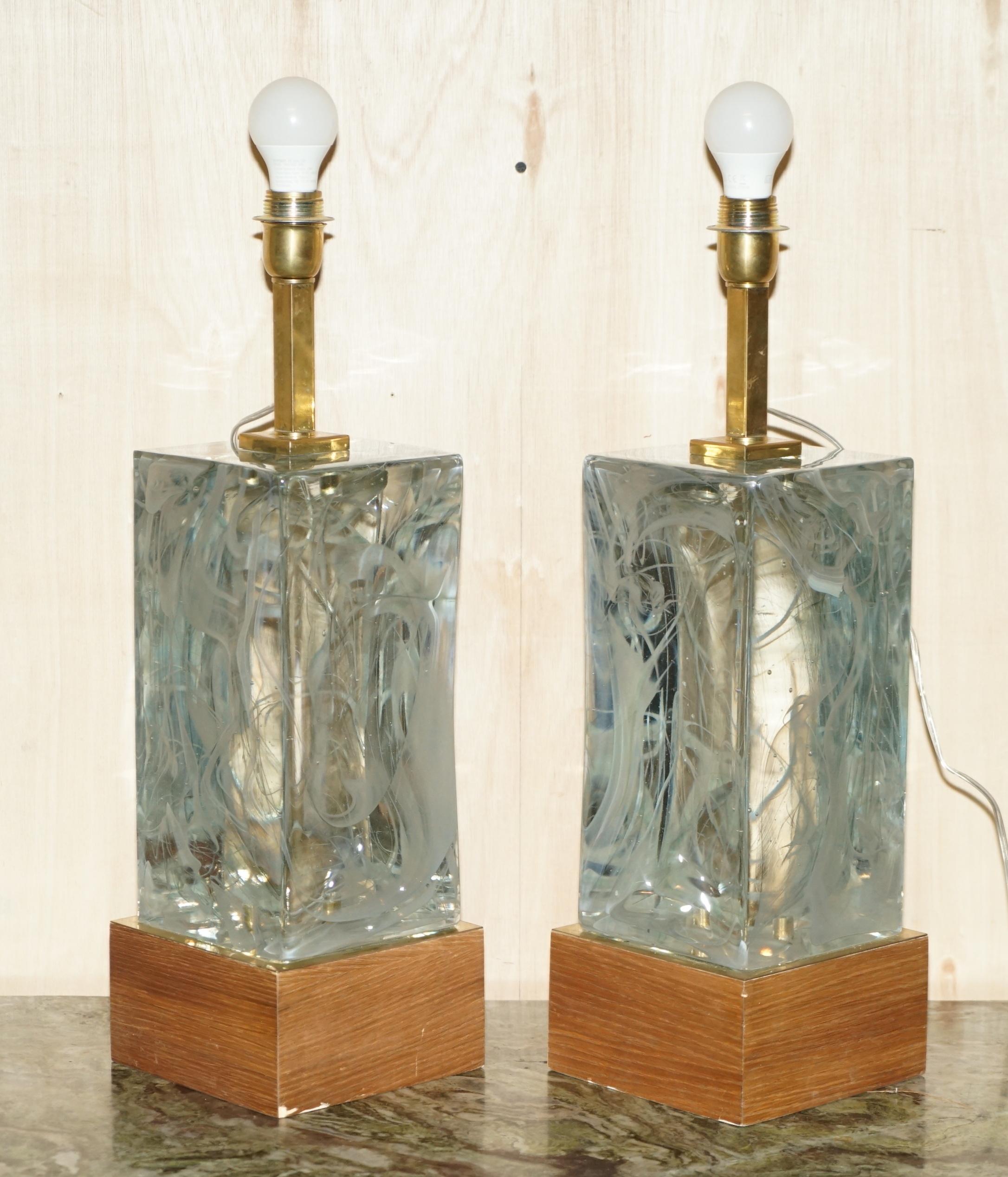 We are delighted to offer for sale this stunning pair of original Murano solid glass large table lamps with marble finish throughout.

These lamps are part of a large selection of Murano lamps that have come straight from the Island of Murano