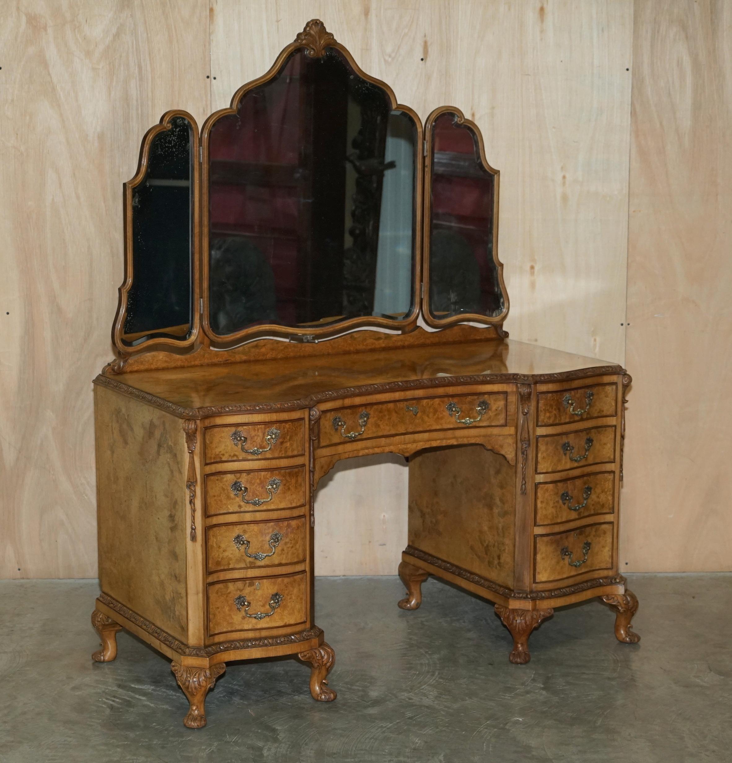 We are delighted to offer for sale this finest quality, hand carved Burr Walnut dressing table with tri folding mirrors and original matching stool

This pair are part of a large bedroom set, I have in total a pair of wardrobes, a dressing table