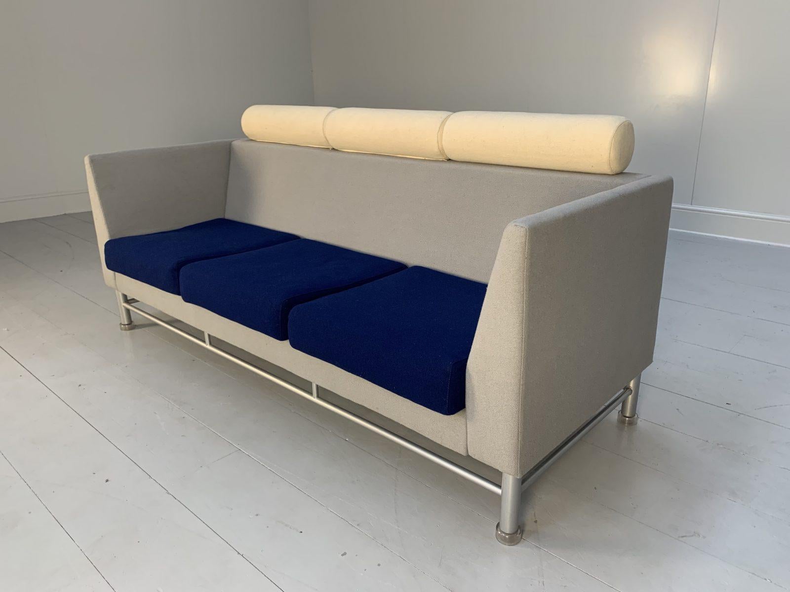 This is quite a find and a genuine 1980’s icon, it being a rare, original “East Side” Sofa from the world renown furniture house of Knoll International, dressed in their sublime Woven Woollen-Felt fabric in Mid-Blue and Grey, and with Silver-Painted