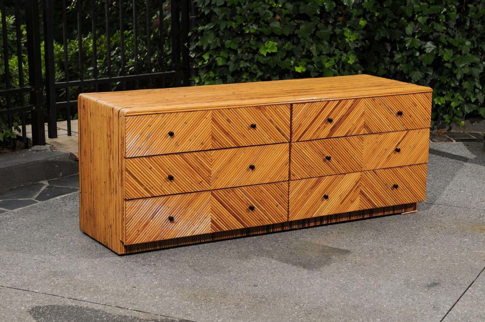 This magnificent chest is shipped as professionally photographed and described in the listing narrative: Meticulously professionally restored and completely installation ready.

A breathtaking meticulously restored bamboo marquetry chest, circa
