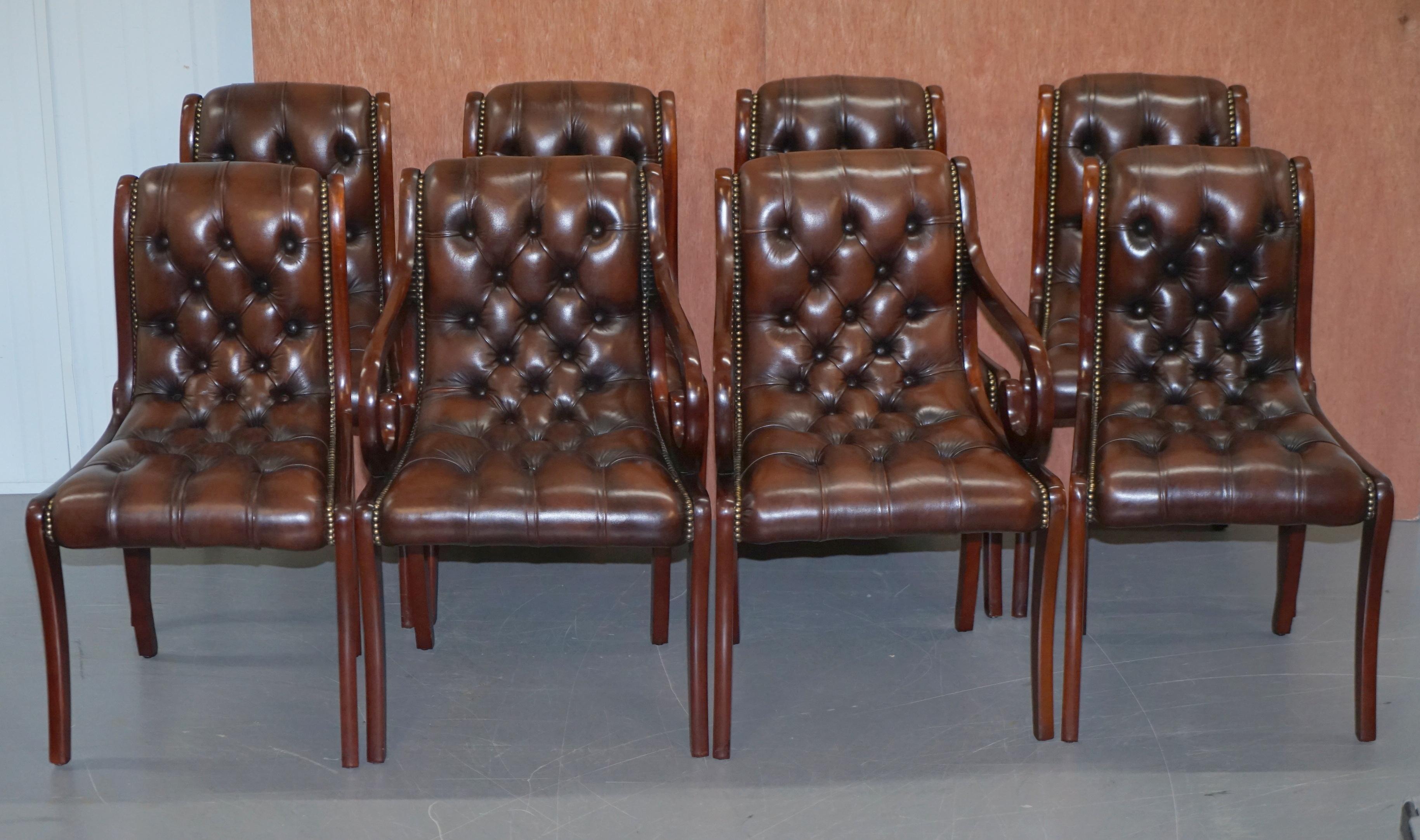 We are delighted to offer for sale this stunning set of eight vintage chesterfield aged chestnut brown leather dining chairs

A very good looking and well made suite, the frames are all mahogany, they have reeded frames running down from the back