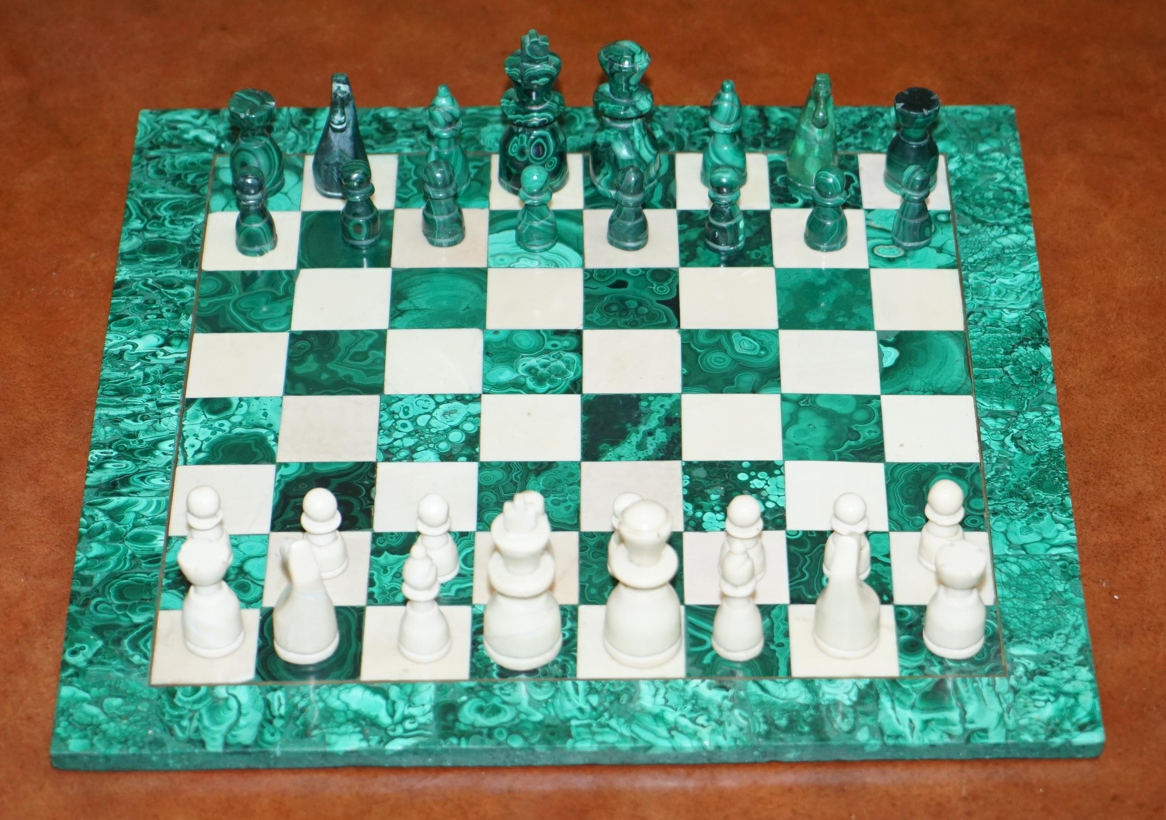 We are delighted to offer for sale this lovely vintage solid Malachite and Marble chess board and pieces

A very good looking decorative and well made set, I have another listed under my other items which is a medium size, this is full