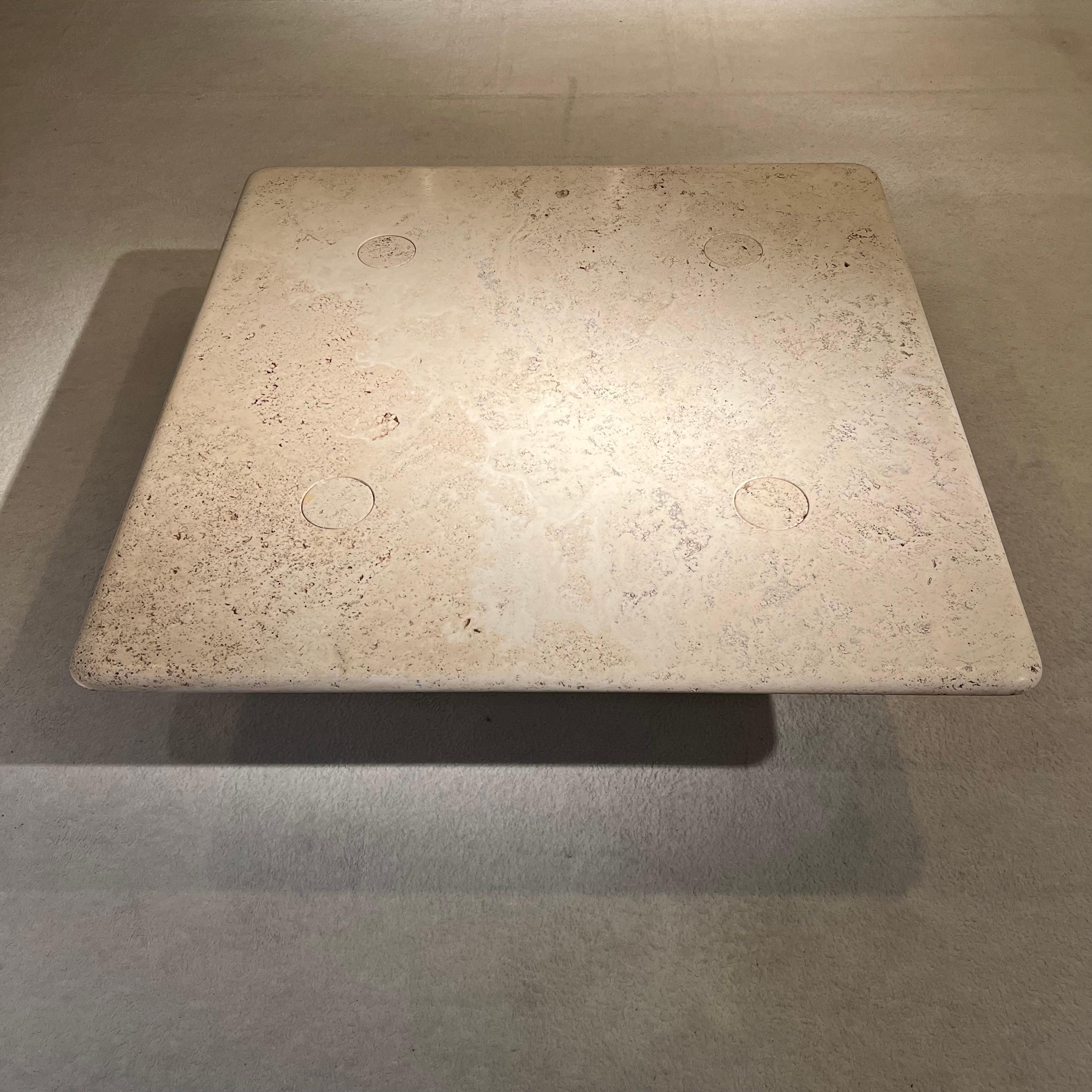 This superb travertine table is the work of Angelo Mangiarotti, an Italian designer of the 1970s.
The table's superb patina, streamlined shape and ideal dimensions make it a softly chic decorative object. 
A timeless model typical of the period and