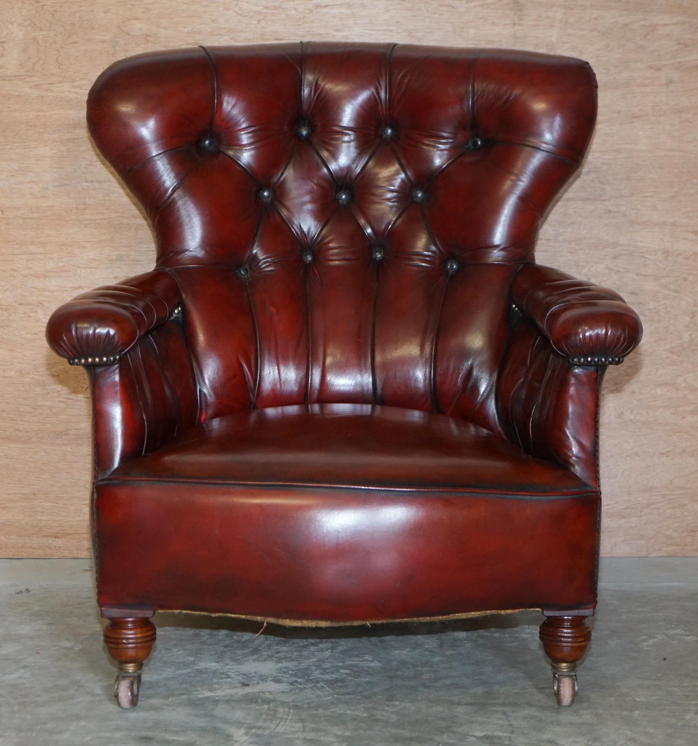 We are delighted to this absolutely sublime fully restored Boudreaux leather Chesterfield tufted library armchair with original porcelain castors 

This is one of the most comfortable armchairs I have ever sat it, it is a large persons chair, it