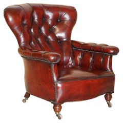 Sublime fauteuil Chesterfield victorien 1860 ancien restauré en cuir bordeaux